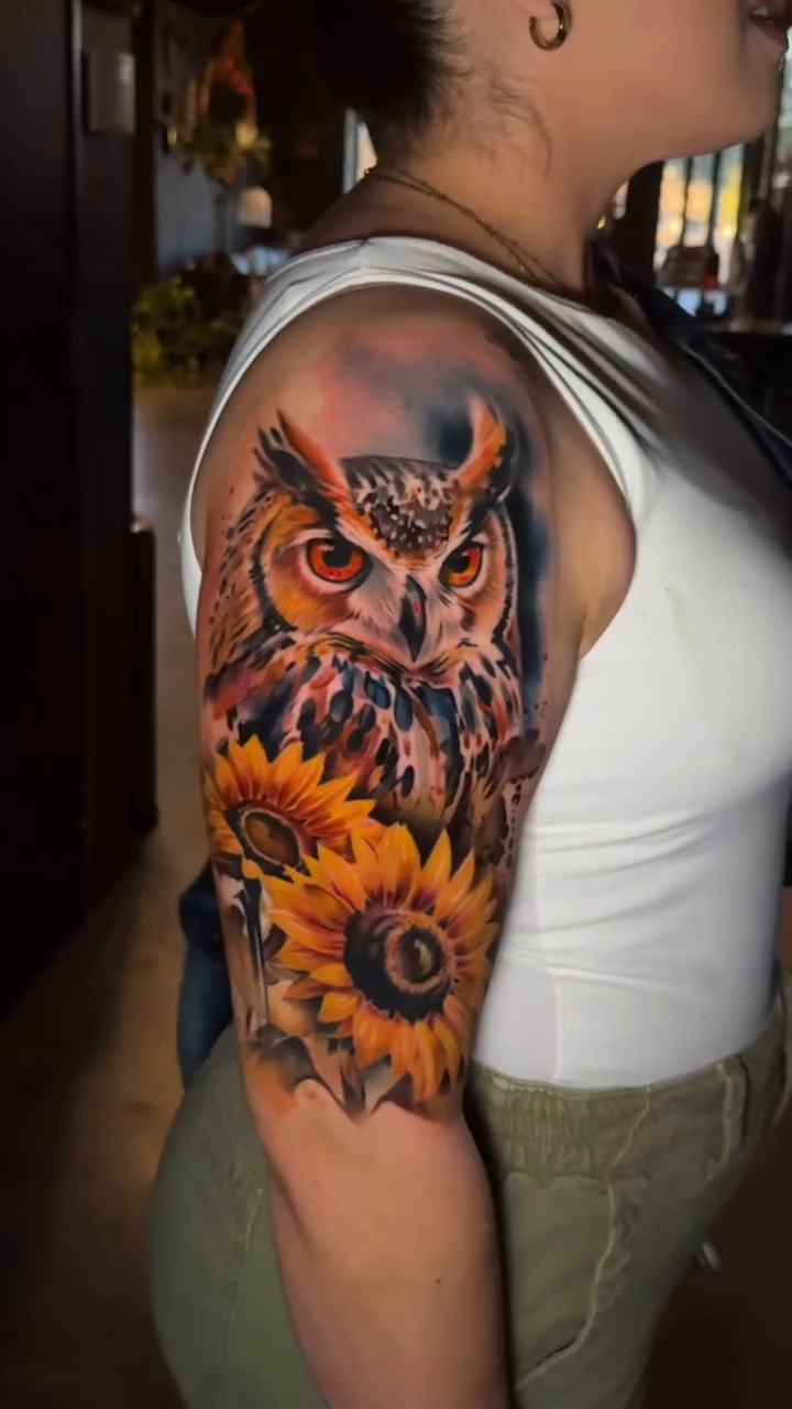 Owl and sunflowers realism tattoo by Martin Reyes Jr