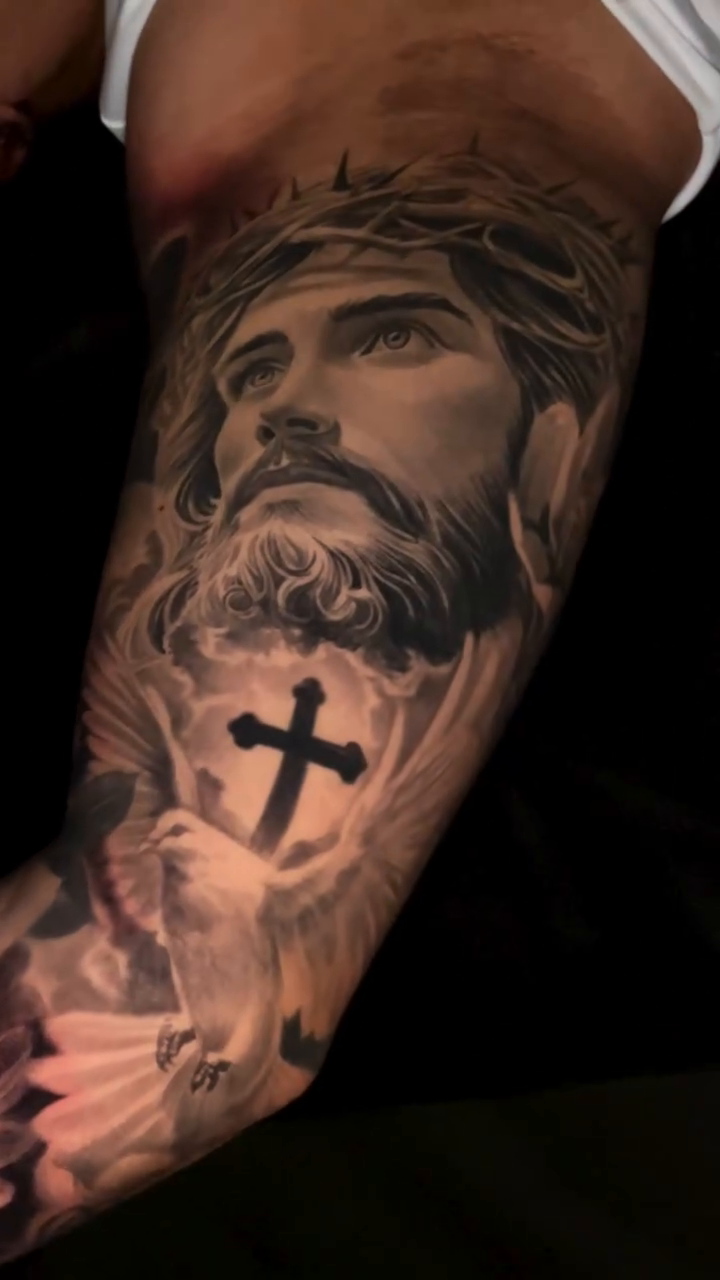 Tattoo by @jorgerosales_tattoos — realism, black_and_grey