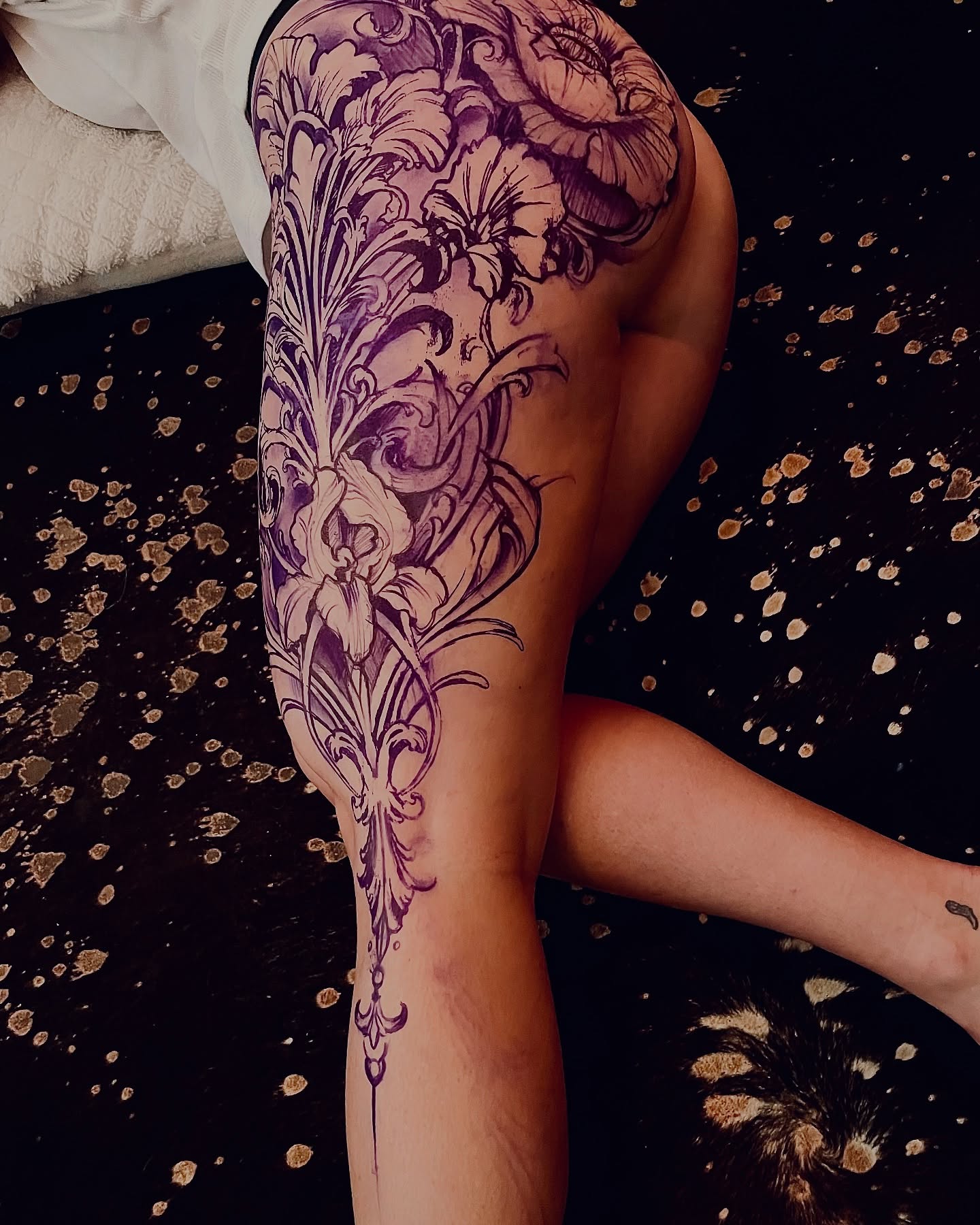 Floral design ornamental tattoo on the leg by David Garner, Los Angeles, California