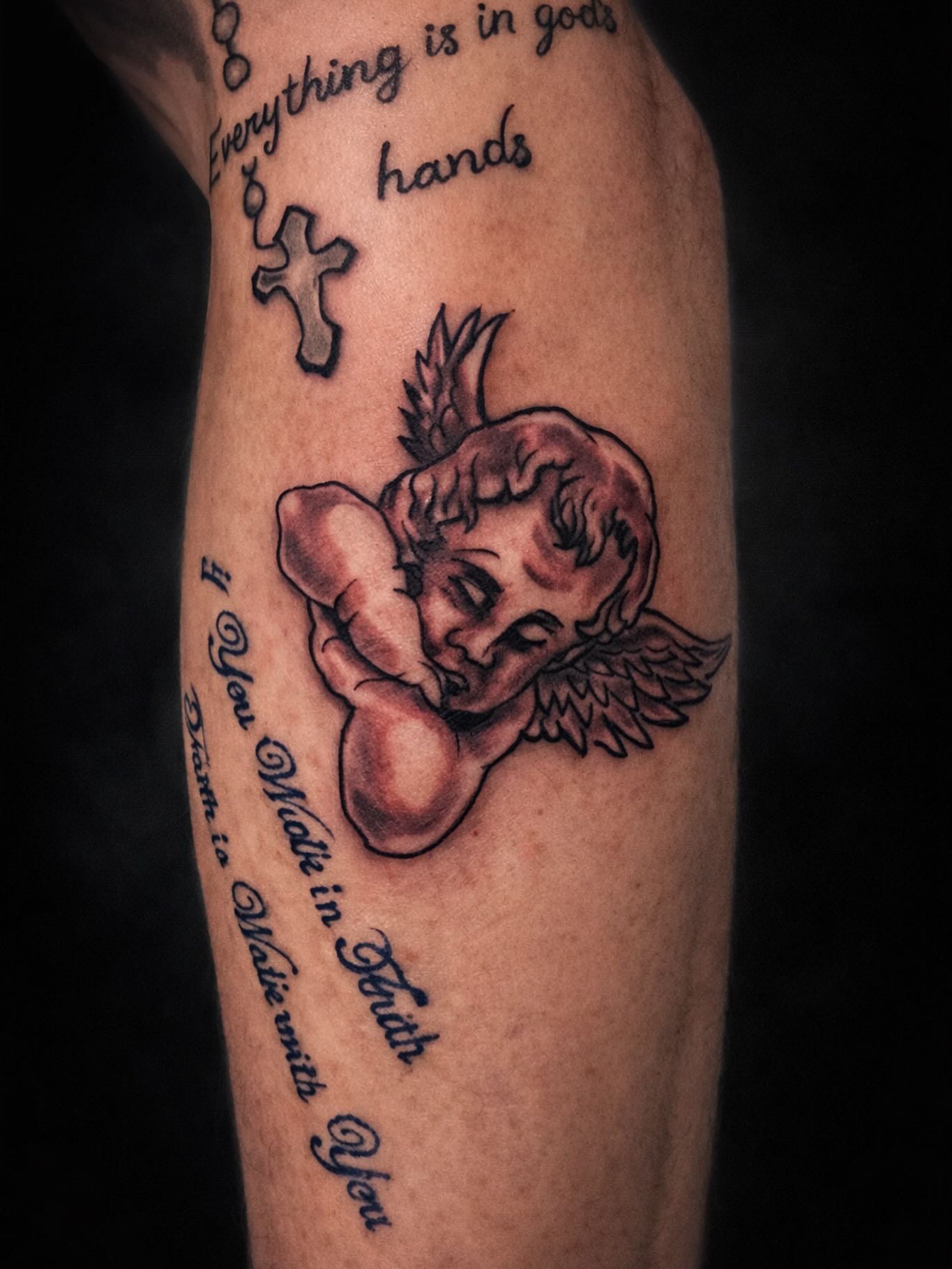 Cherub realism tattoo on the forearm by Salvador Mendoza, Sesto San Giovanni