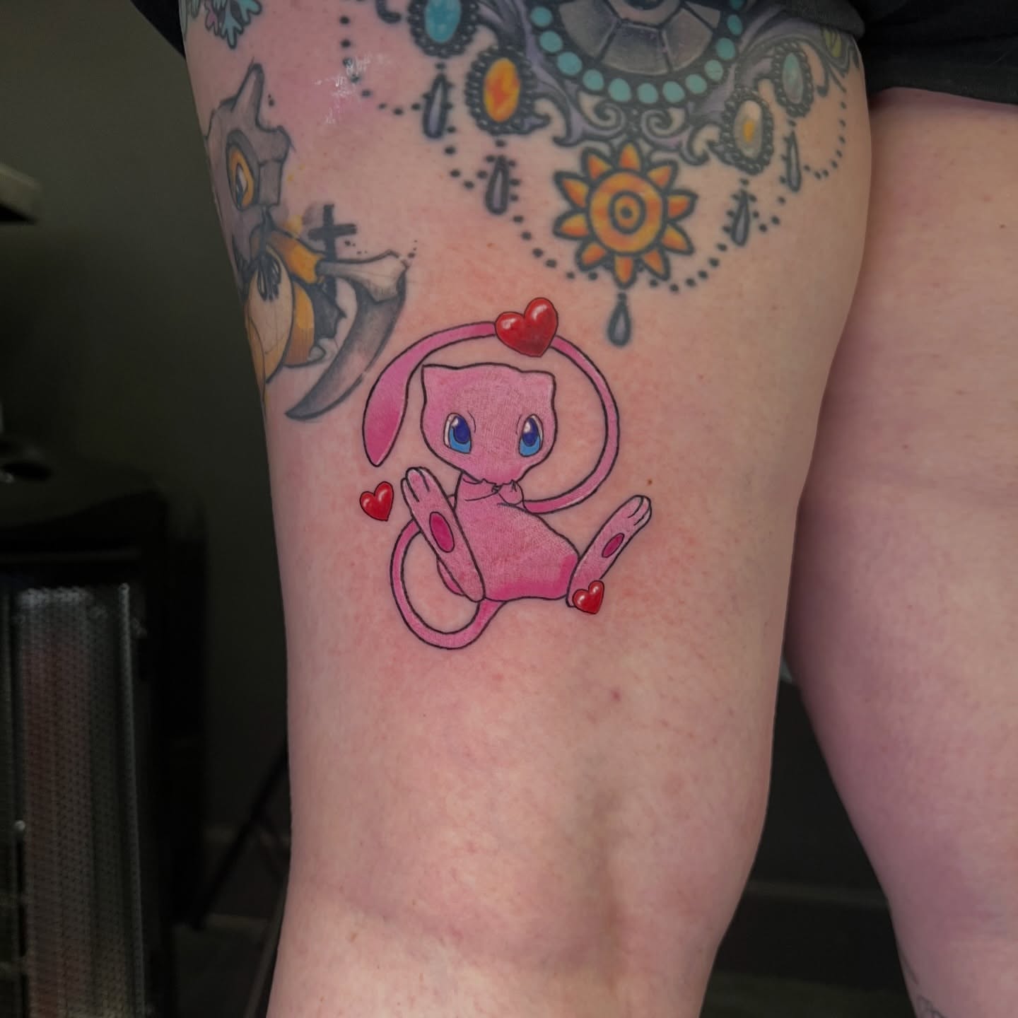 Mew dotwork tattoo on the forearm by Leslie Paskoff