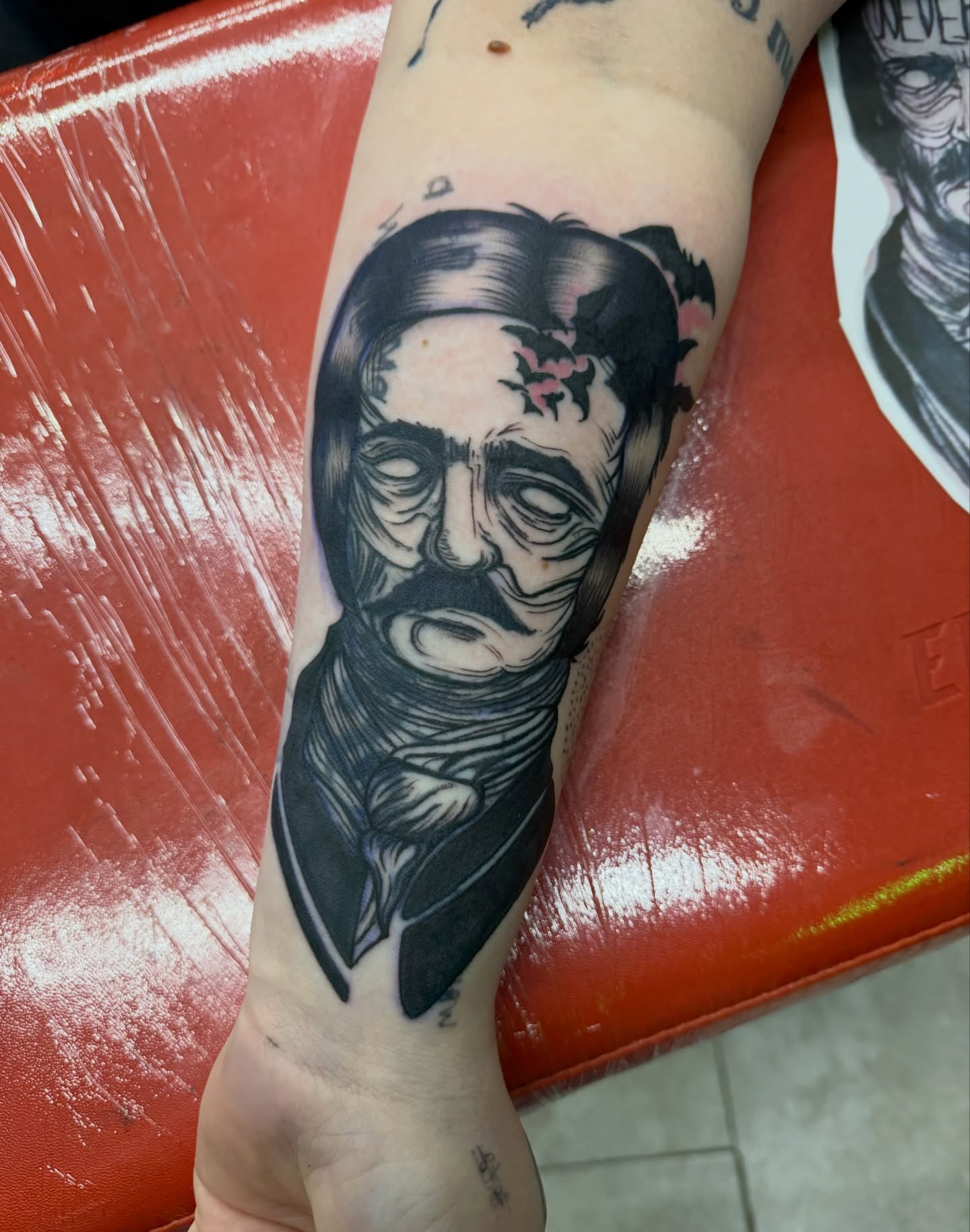 Man's face realism tattoo on the forearm by Squid