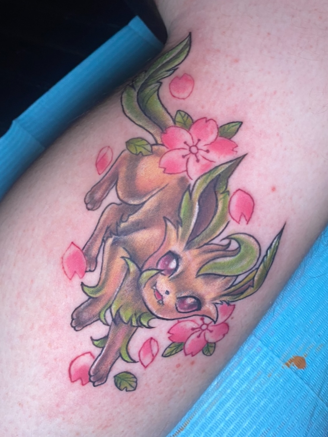 Deer and cherry blossoms new school tattoo on the thigh by Brittany Whitaker