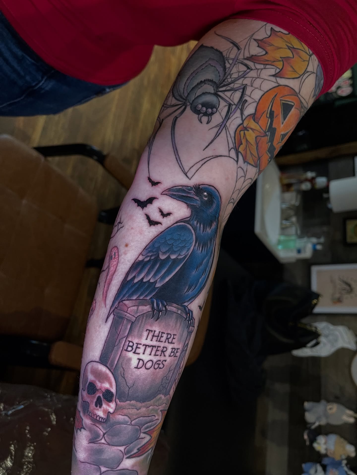 Raven and spider realism tattoo on the forearm by Blake Alan Tattoos (TROUT)