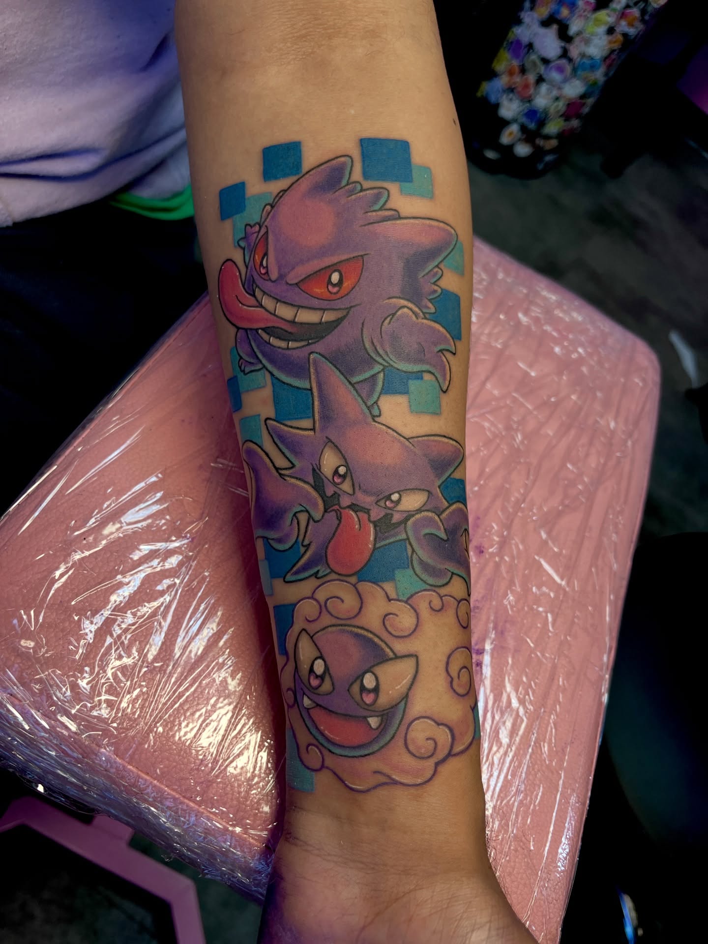 Ghost Pokémon dotwork tattoo on the forearm by Cheyanne Peck