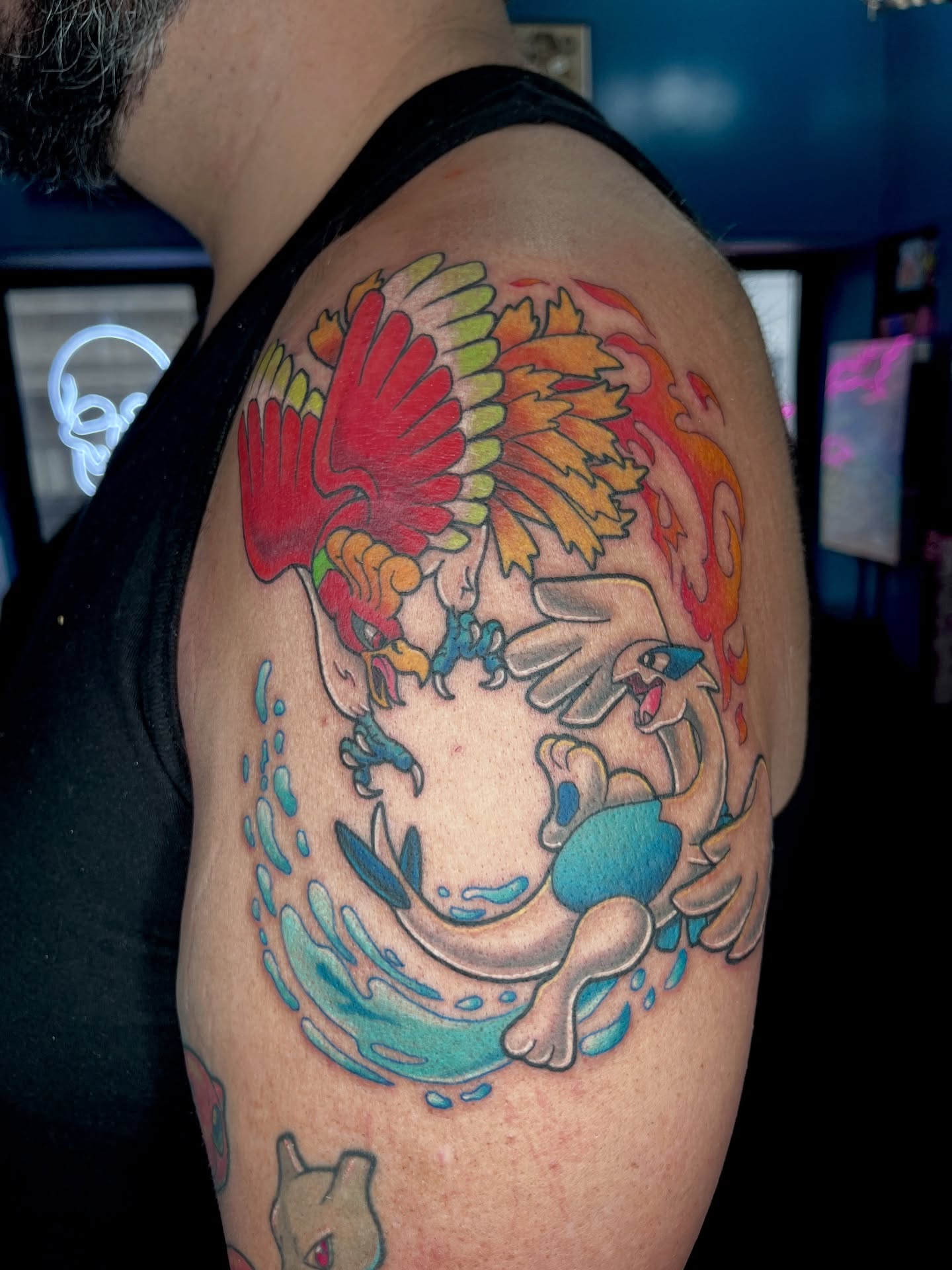 Two birds dotwork tattoo on the shoulder by Cheyanne Peck