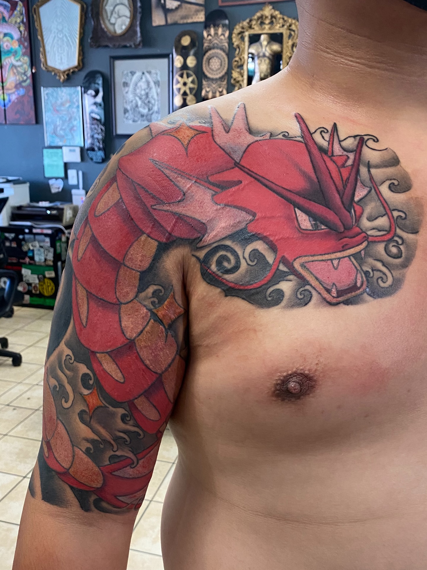 Red dragon japanese irezumi tattoo on the chest by Toni🌊