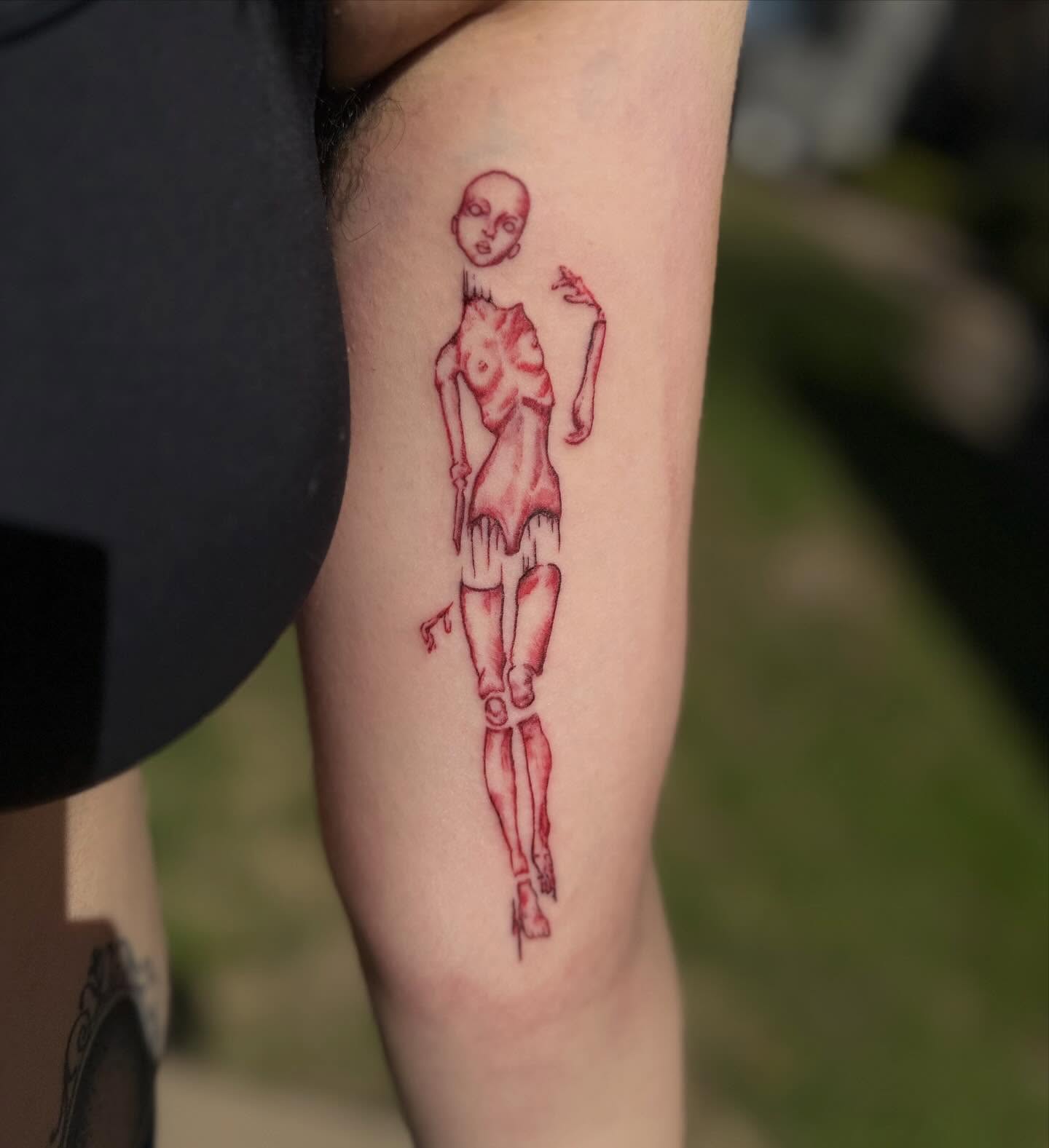 Alien figure dotwork tattoo on the forearm by Cullen-Lee