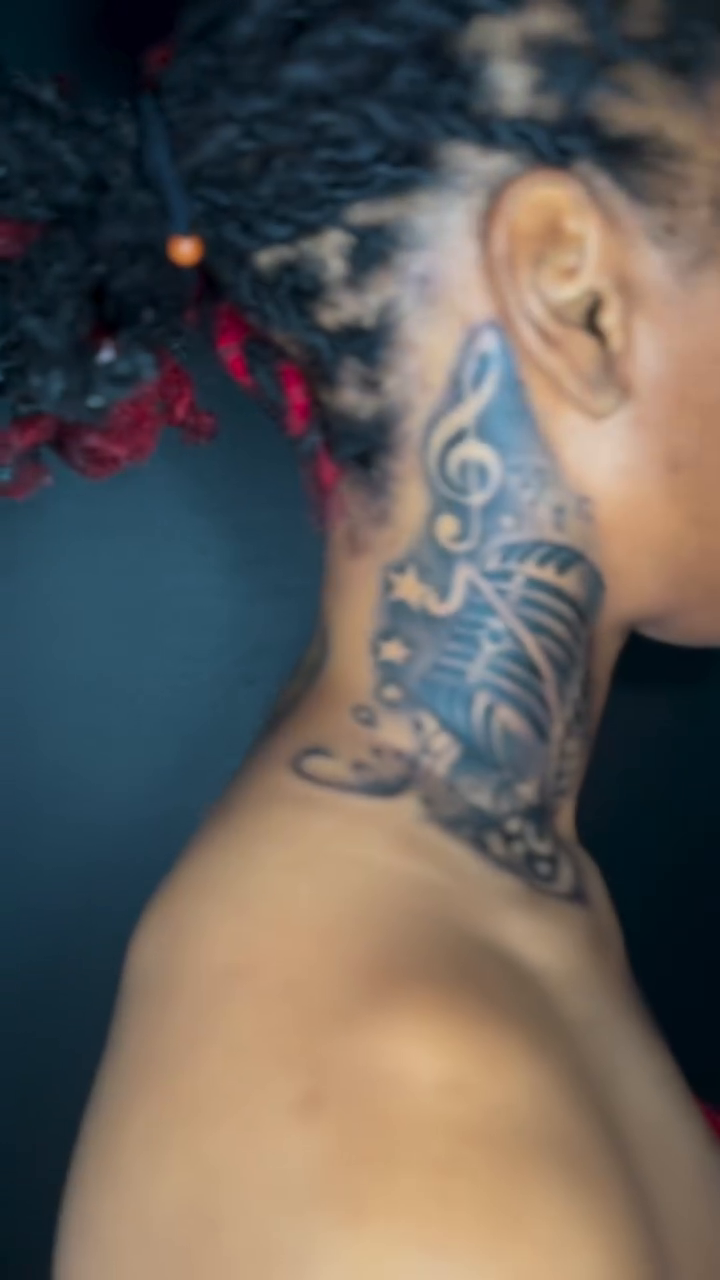 Microphone and musical notes geometric tattoo by Mariyah Rhae Lewis