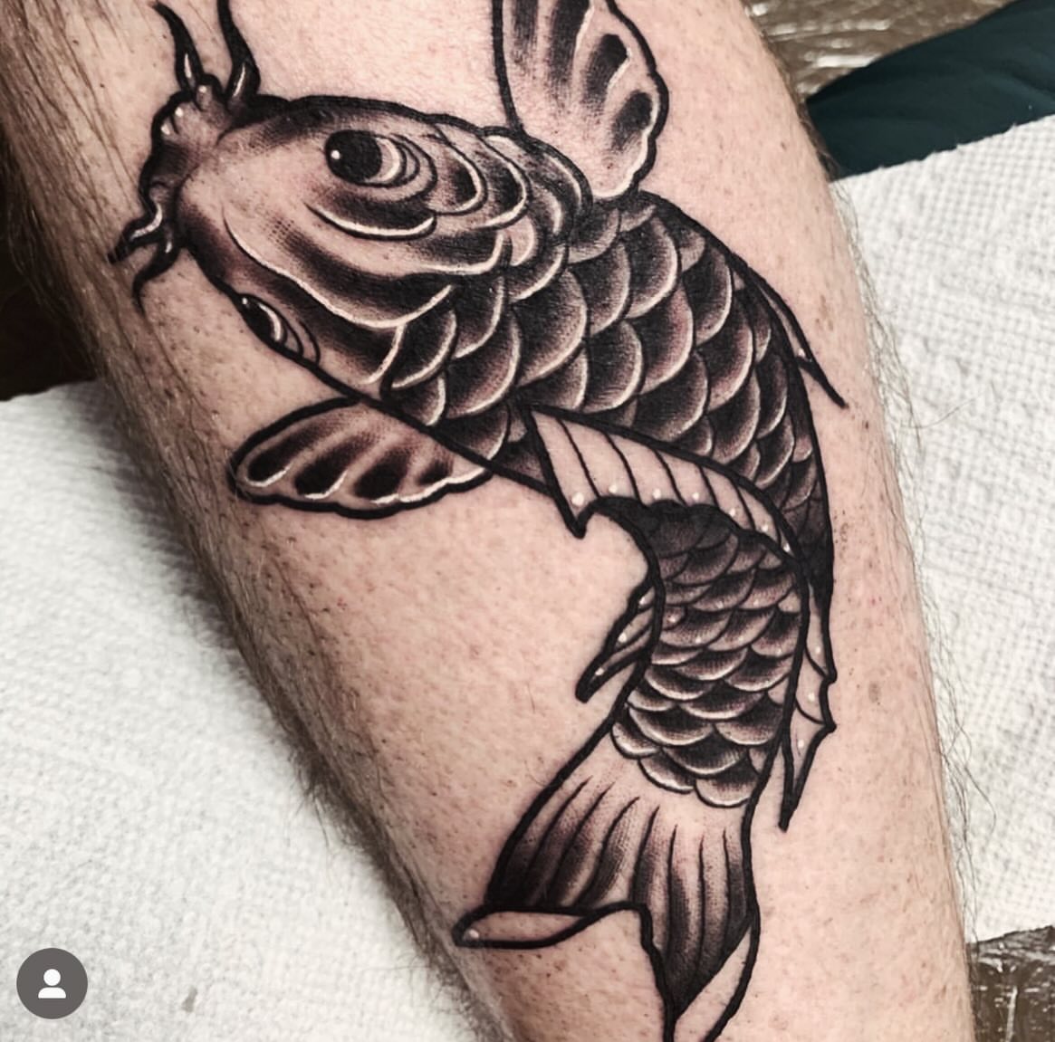 Koi fish black and grey tattoo on the forearm by Brandon Harrison, Kansas City, Missouri