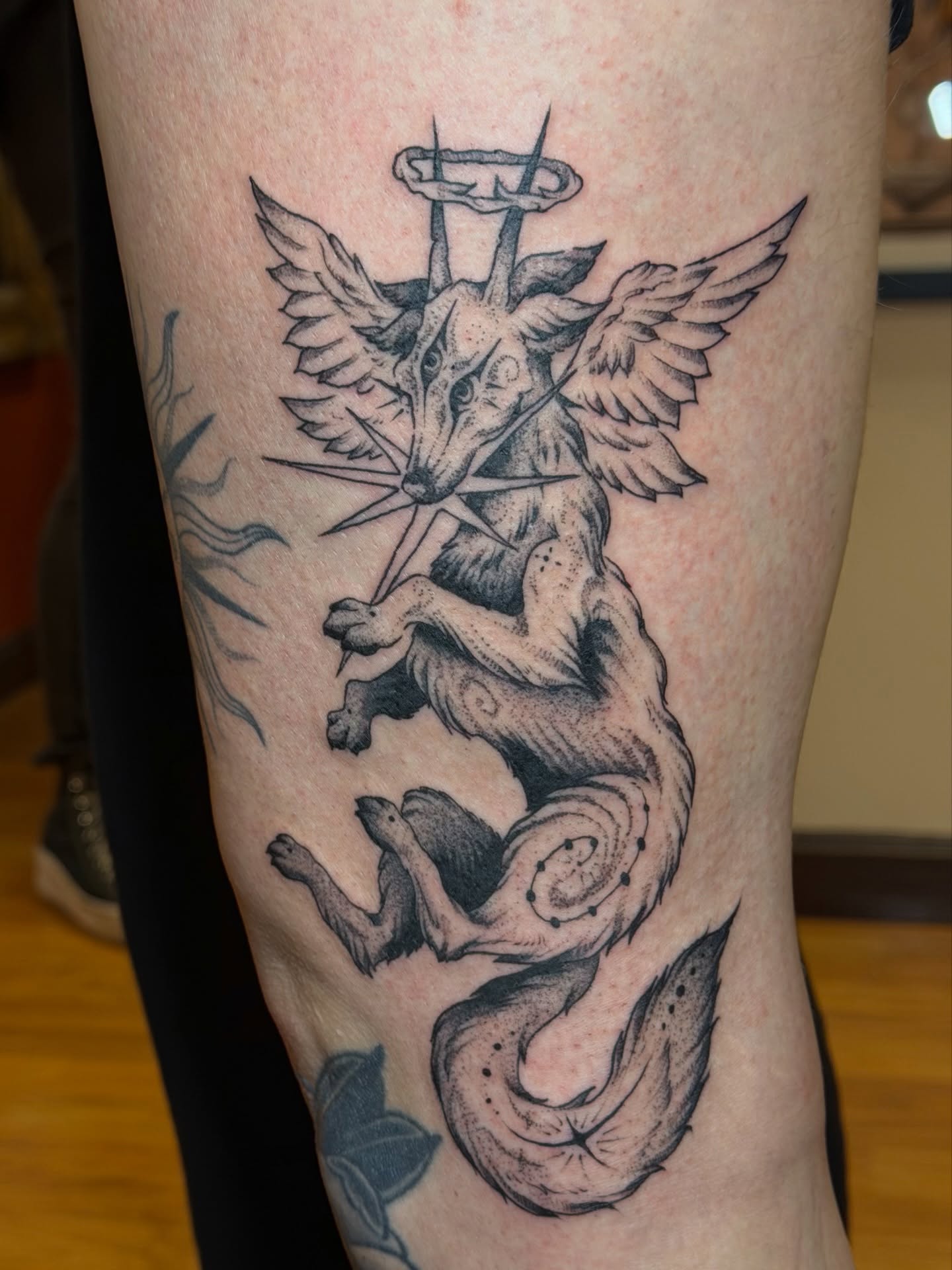 Mythical fox black and grey tattoo on the forearm by Gianna Calisi