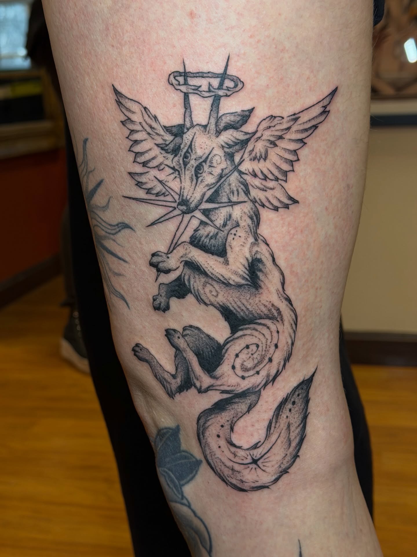 Fox with wings realism tattoo on the forearm by Gianna Calisi