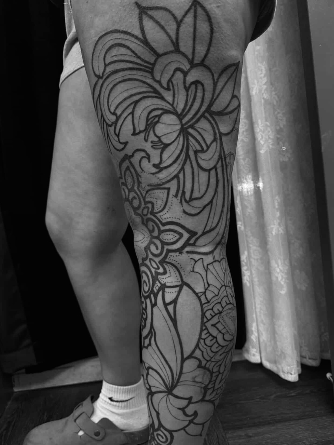 Floral pattern black and grey tattoo on the calf by Ciera Farni, Murray, Utah
