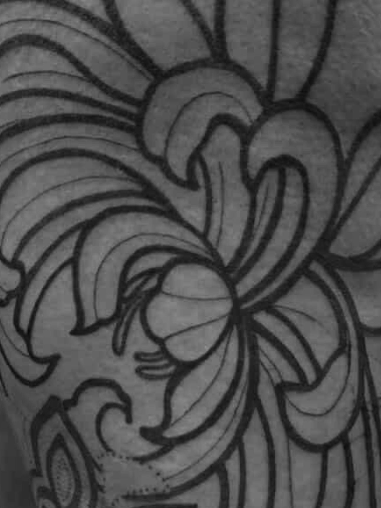 Floral design black and grey tattoo on the forearm by Ciera Farni, Murray, Utah