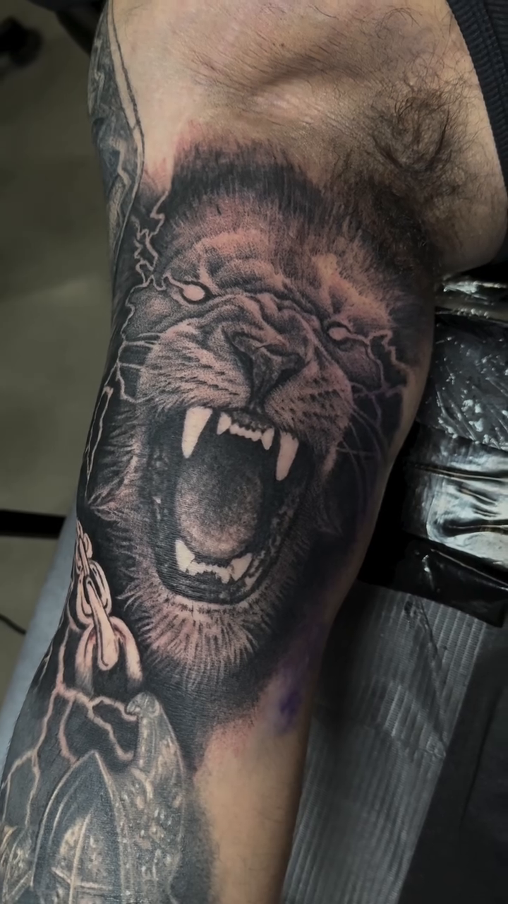 Tattoo by @absolute_culturemx — realism, black_and_grey