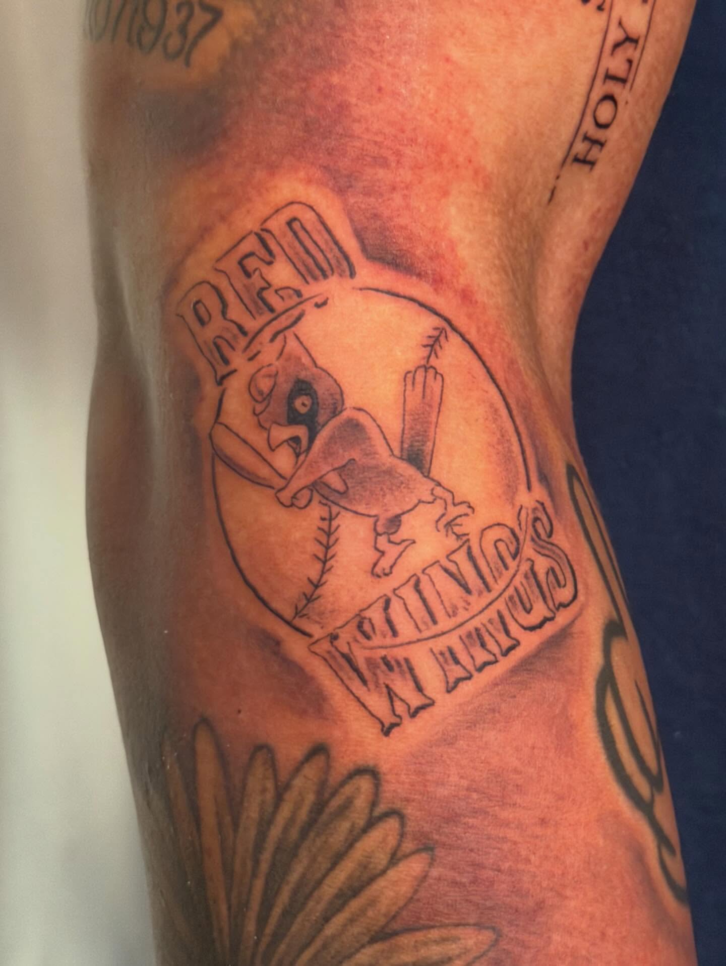 Red sox logo black and grey tattoo on the forearm by James Nelson