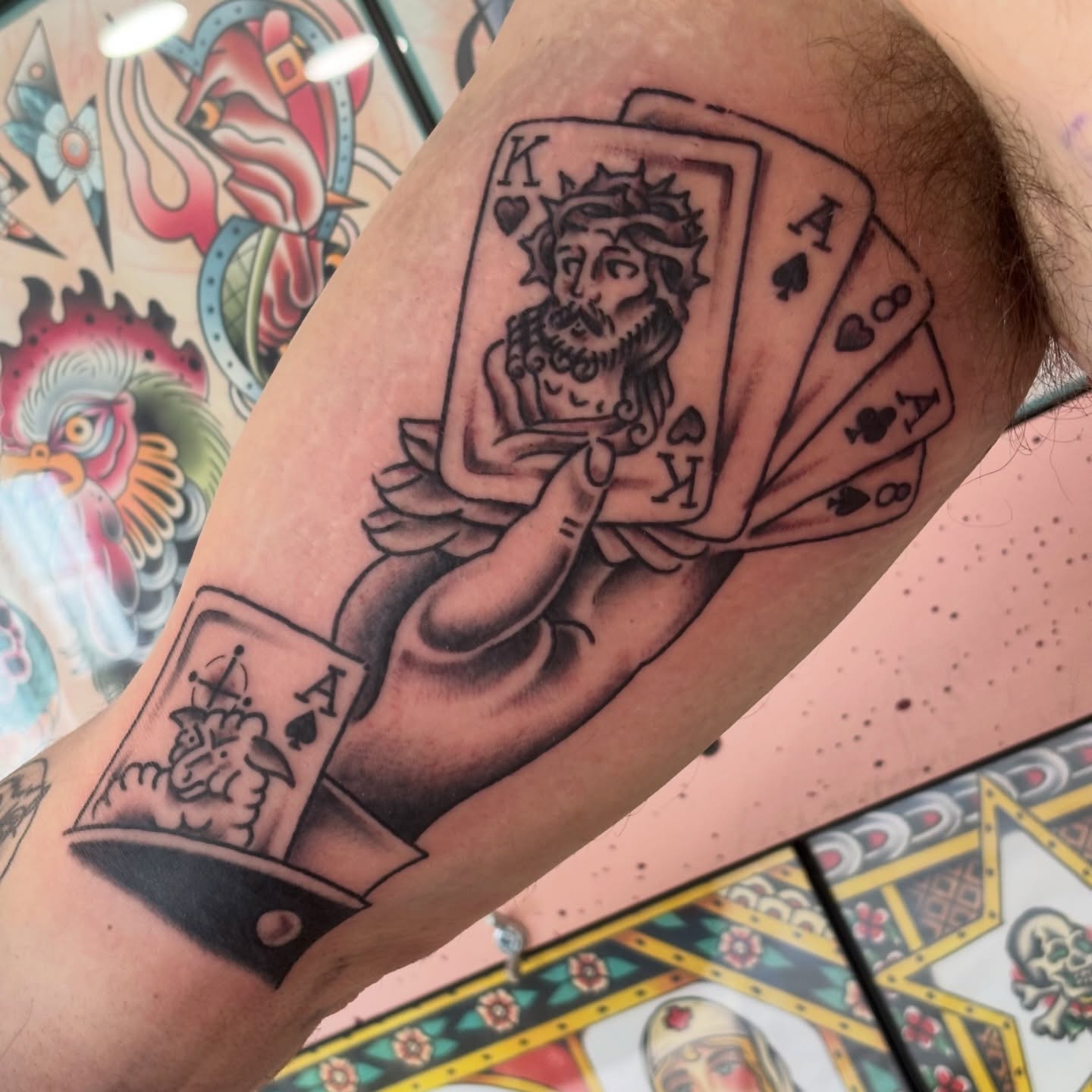 Playing cards American traditional tattoo on the forearm by Malachi