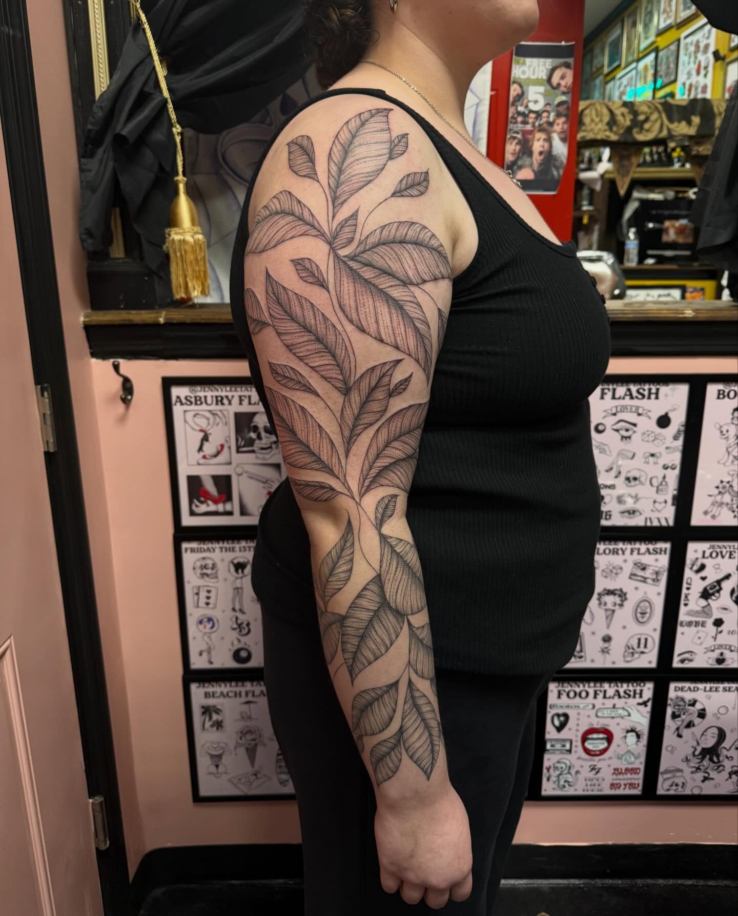 Leafy vine black and grey tattoo on the upper arm by Jennylee Aerts, Asbury Park, New Jersey