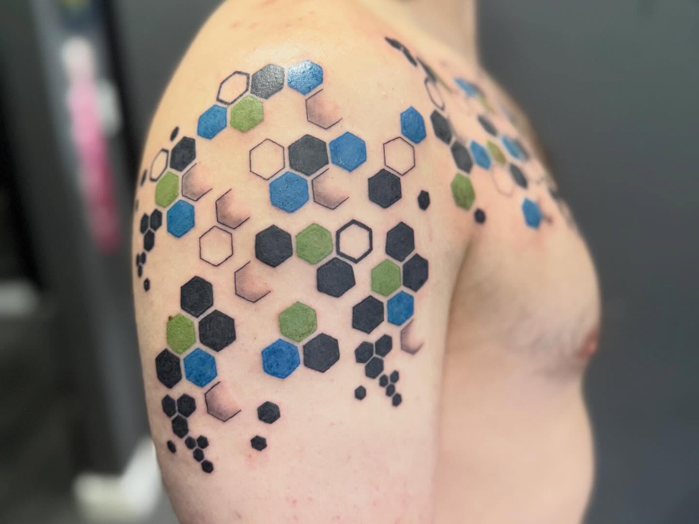 Hexagon pattern geometric tattoo on the shoulder by Camryn Justice