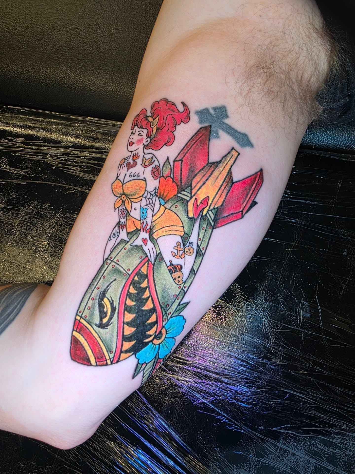 Rocket girl American traditional tattoo on the forearm by Dylan Fowler