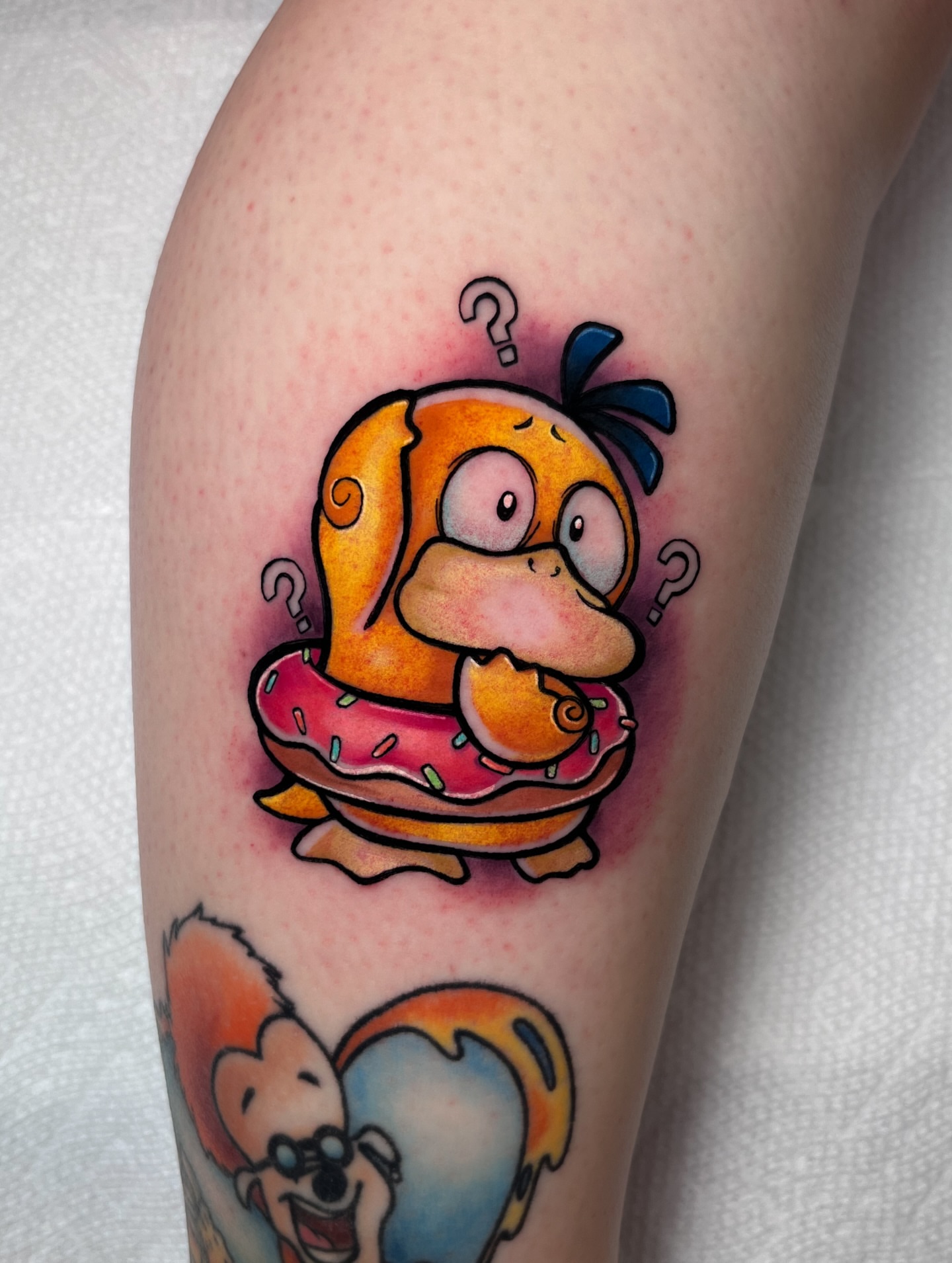 Squirtle donut new school tattoo on the forearm by ʙᴇᴄᴄᴀ ʟʏɴɴ