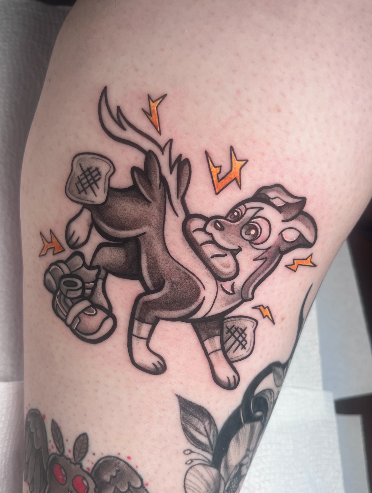 Reindeer and bulldog American traditional tattoo on the thigh by ʙᴇᴄᴄᴀ ʟʏɴɴ