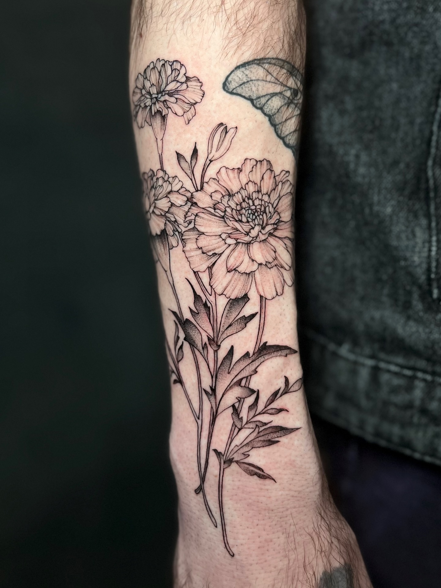 Flowers and butterfly black and grey tattoo on the forearm by Tehnaya