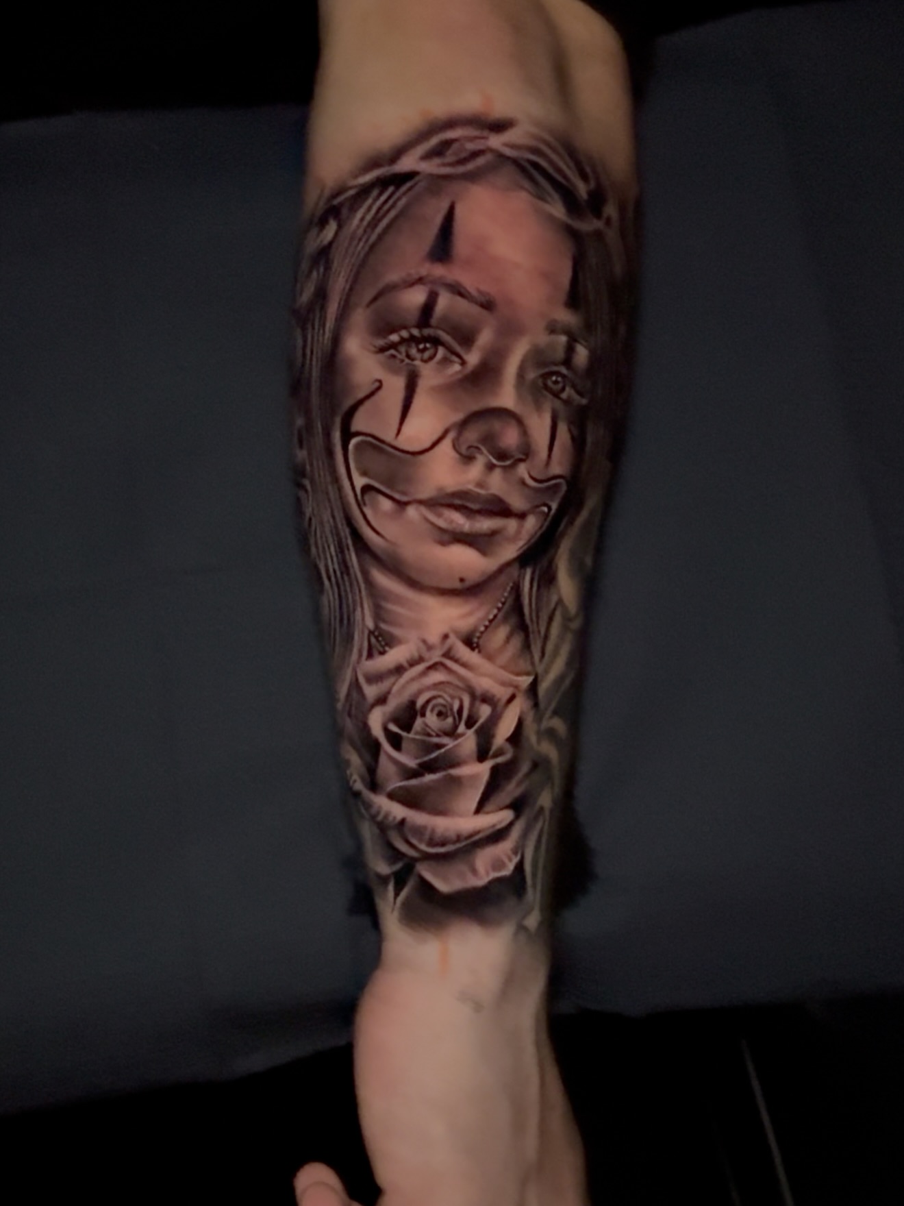Woman's face with rose realism tattoo on the forearm by Erick @ AZTEC_TATT