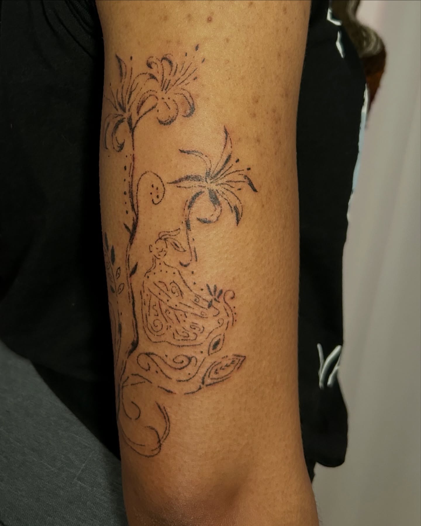 Floral design dotwork tattoo on the forearm by wanderfernfairy