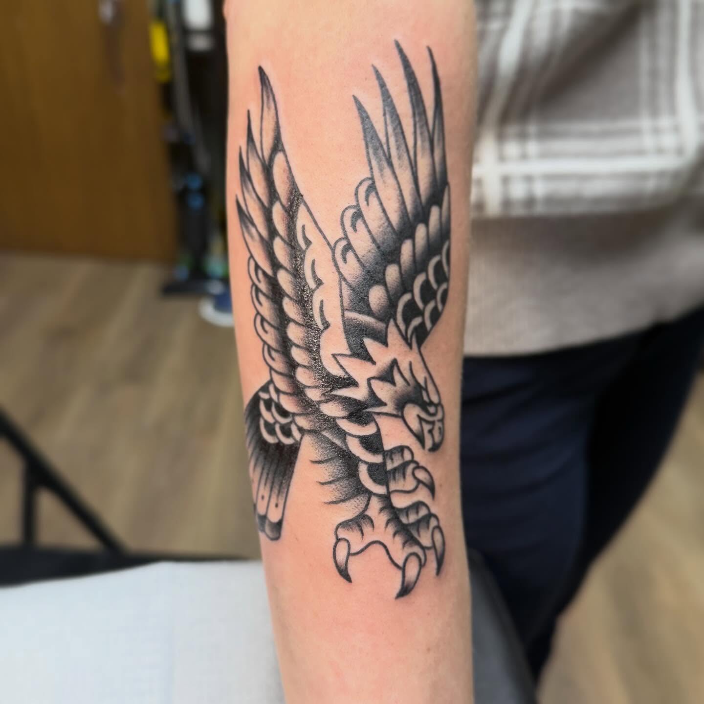 Eagle American traditional tattoo on the forearm by Tina Gregg, North Ridgeville, Ohio