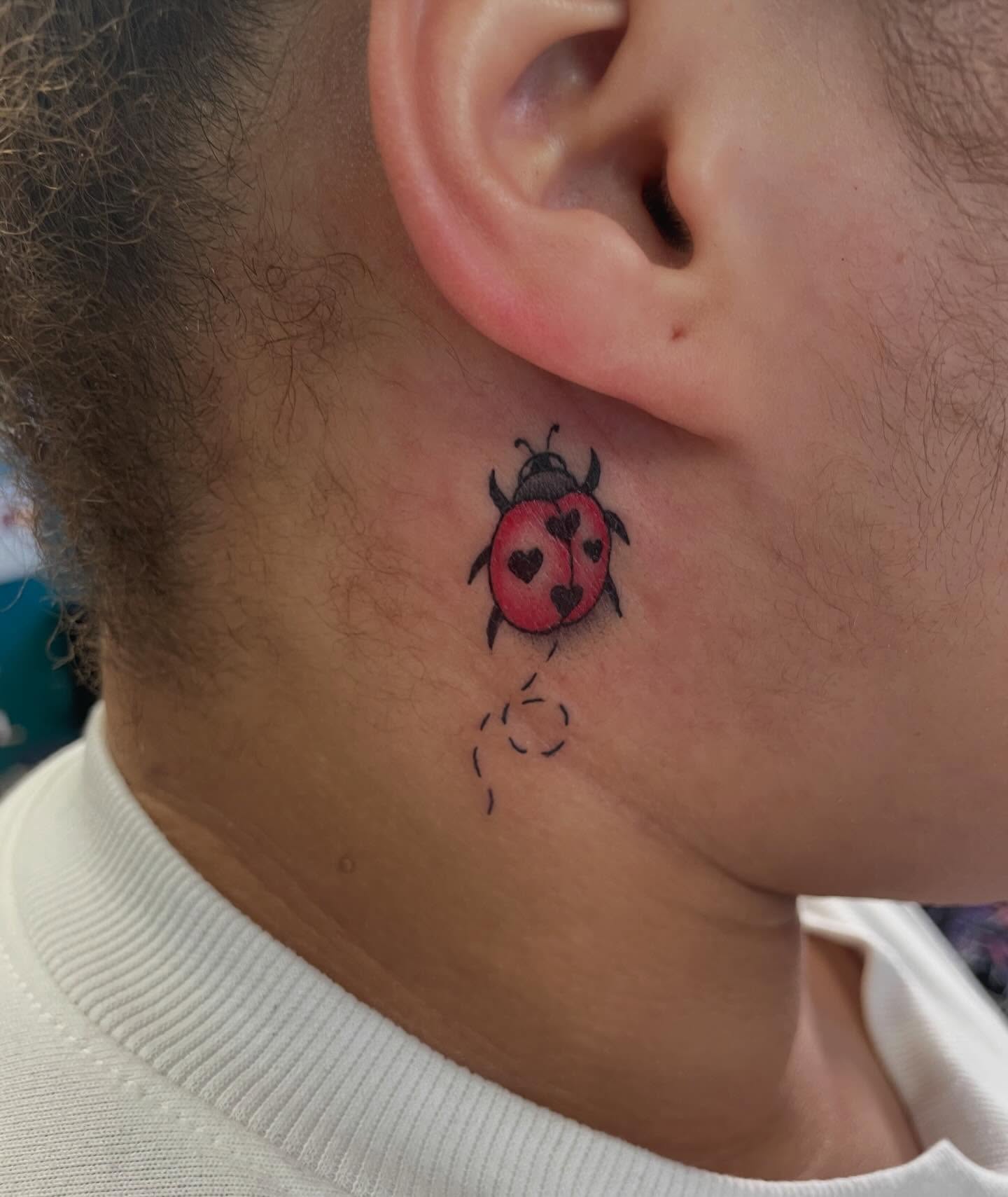 Ladybug dotwork tattoo on the neck by Shan 🤘 Tattoo Artist ⚡️ MN 🌲