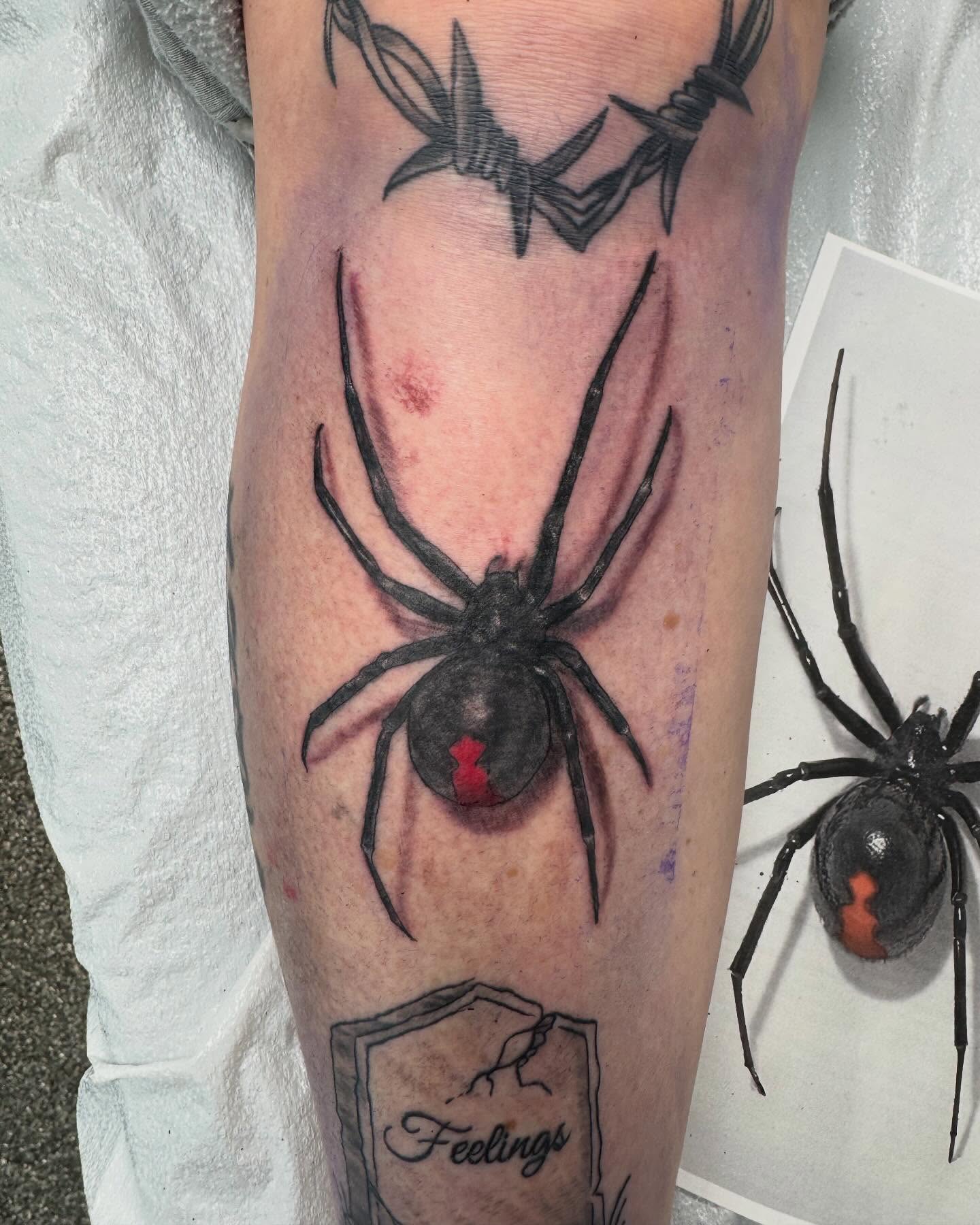 Black widow spider realism tattoo on the forearm by Brazun Locker Poloschan