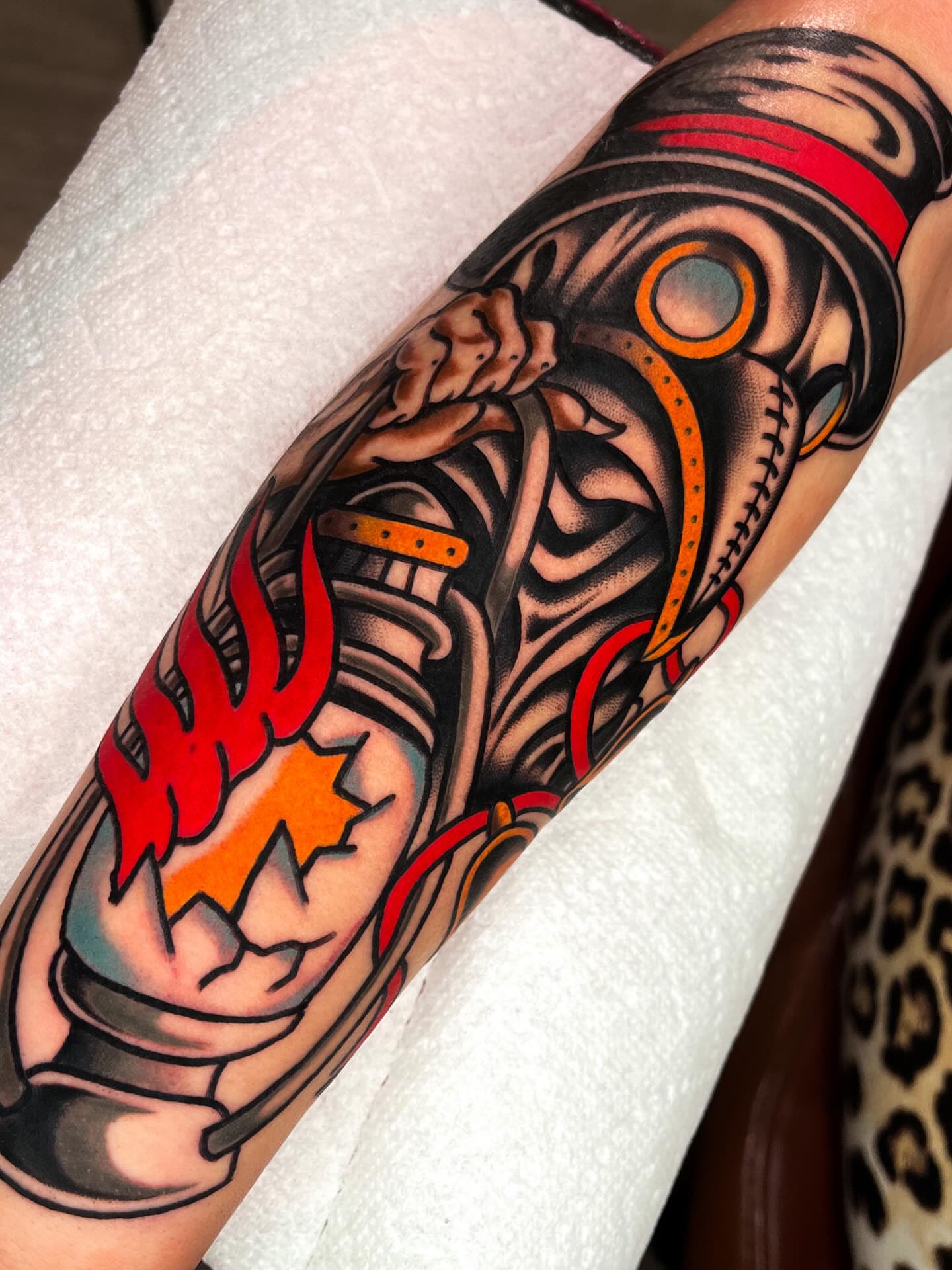 Mechanical armor American traditional tattoo on the forearm by Sky G, Colorado Springs, Colorado