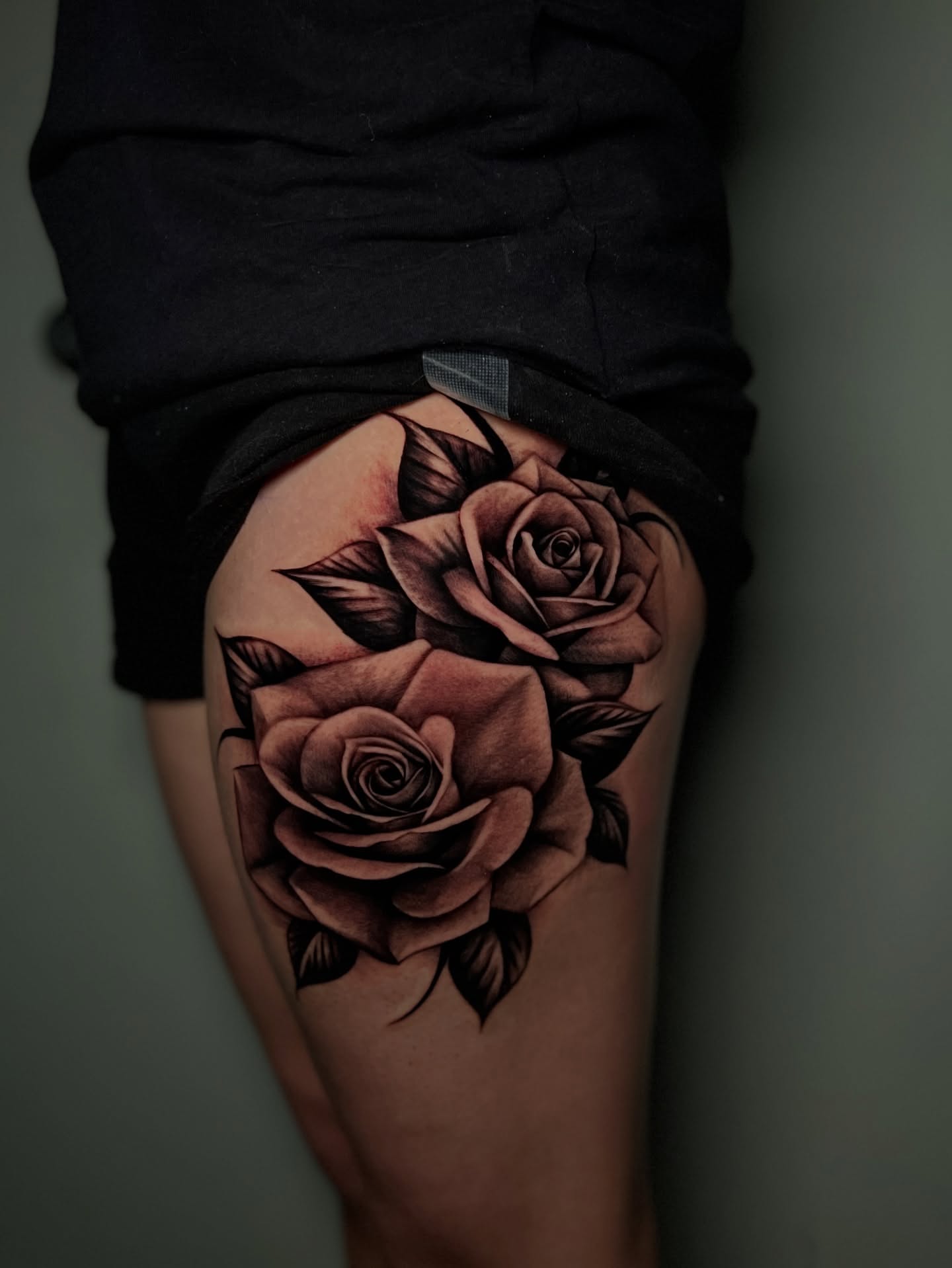 Roses realism tattoo on the thigh by Kiki Tattoos😈