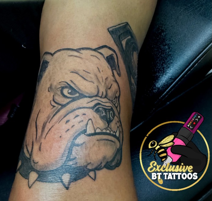 Bulldog head realism tattoo on the forearm by @x1u5iv3bttattz