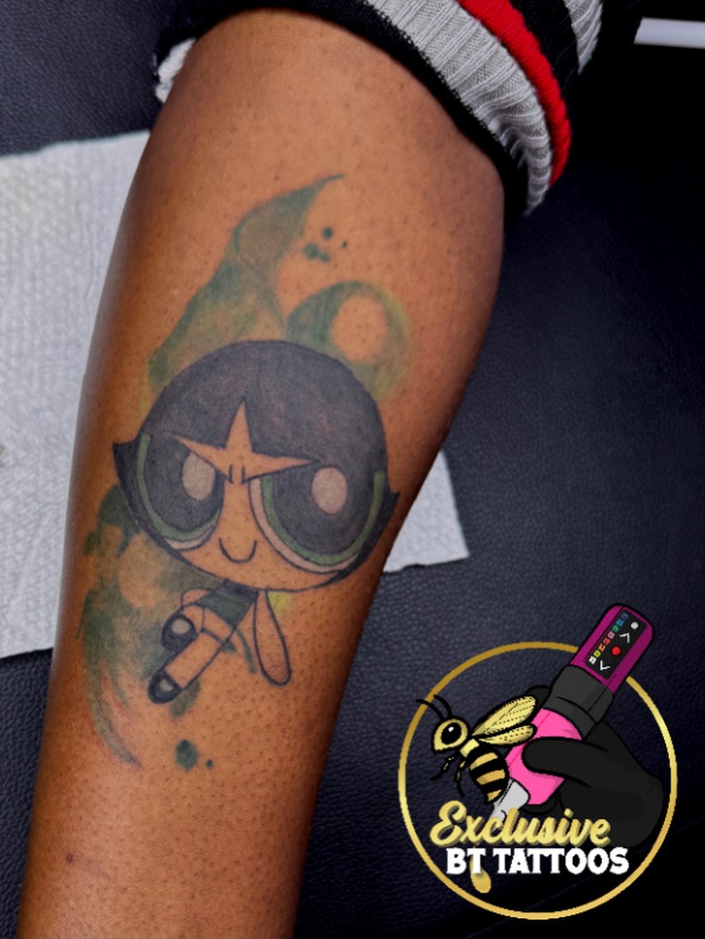 Buttercup from Powerpuff Girls new school tattoo on the forearm by @x1u5iv3bttattz