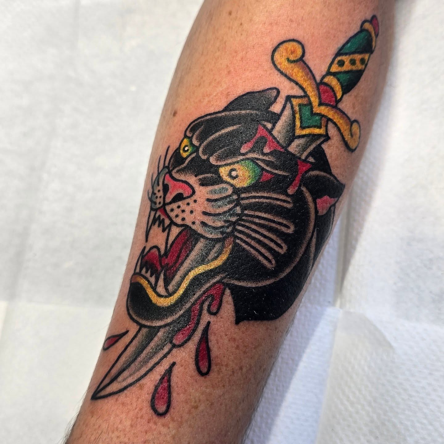 Panther American traditional tattoo on the forearm by A. Teixeira, Los Angeles, California