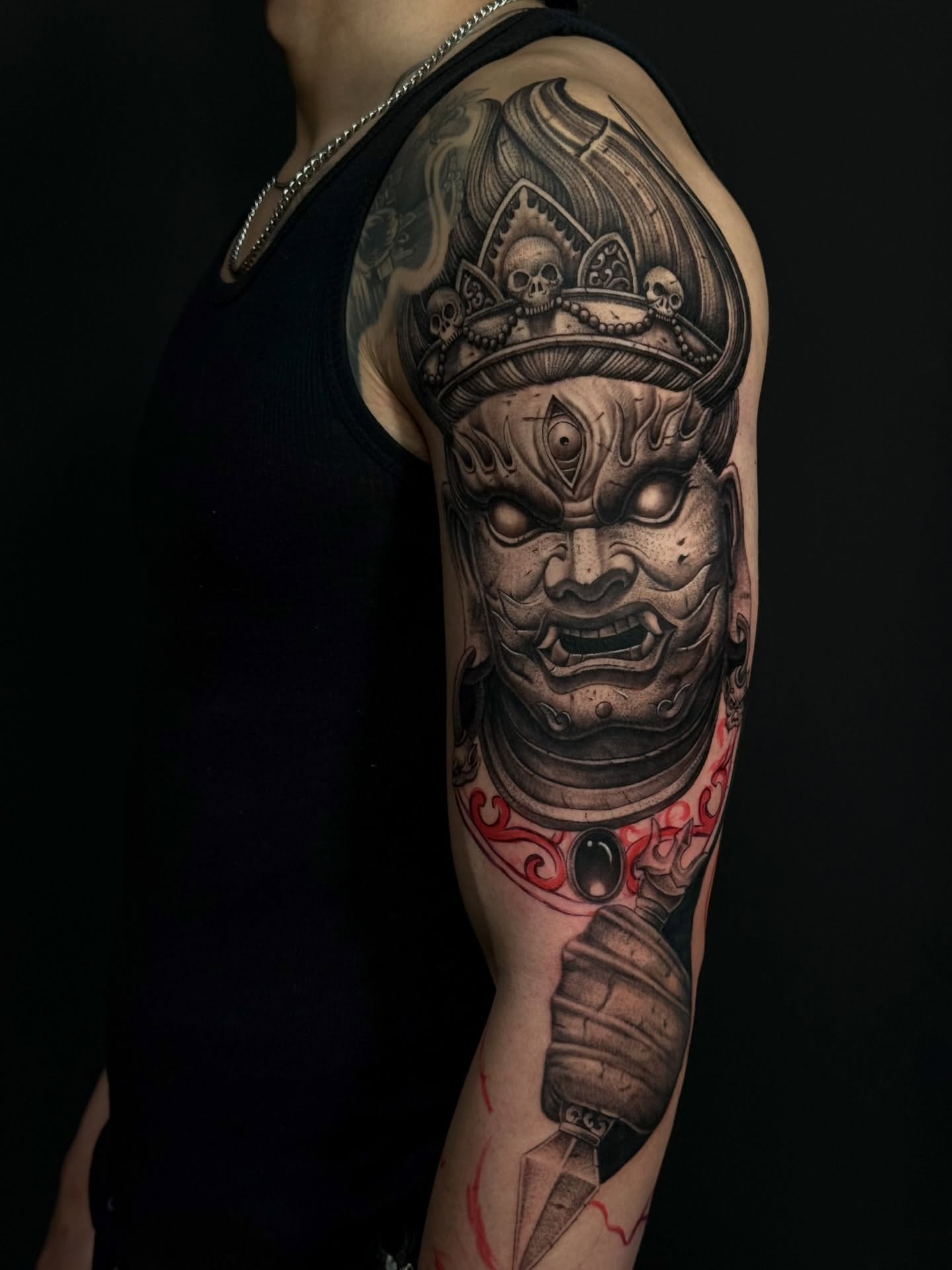 Warrior mask realism tattoo on the forearm by Anh Nguyen