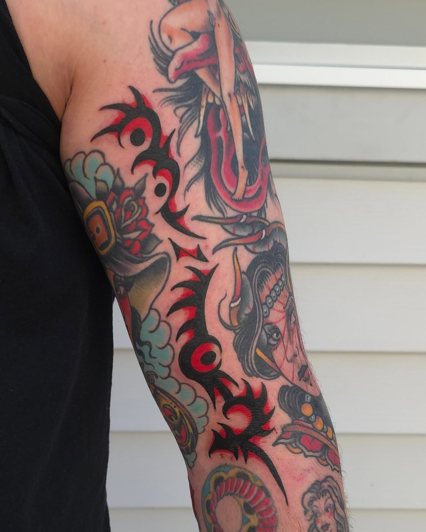 Woman and dragon American traditional tattoo on the forearm by J. Kirsch New Jersey Tattoo Artist