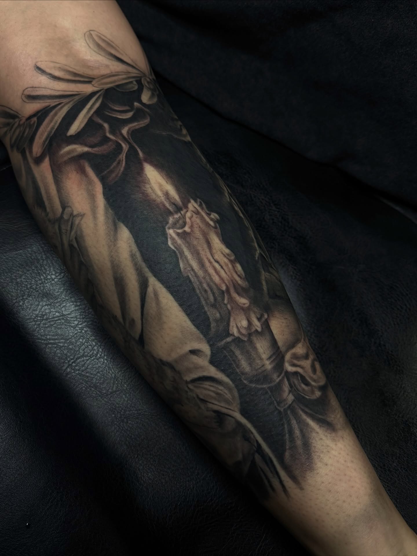 Religious figure realism tattoo on the forearm by Mags🗡️