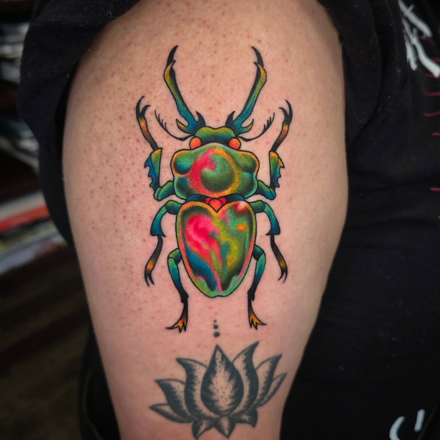 Beetle new school tattoo on the thigh by Joseph Jeffers