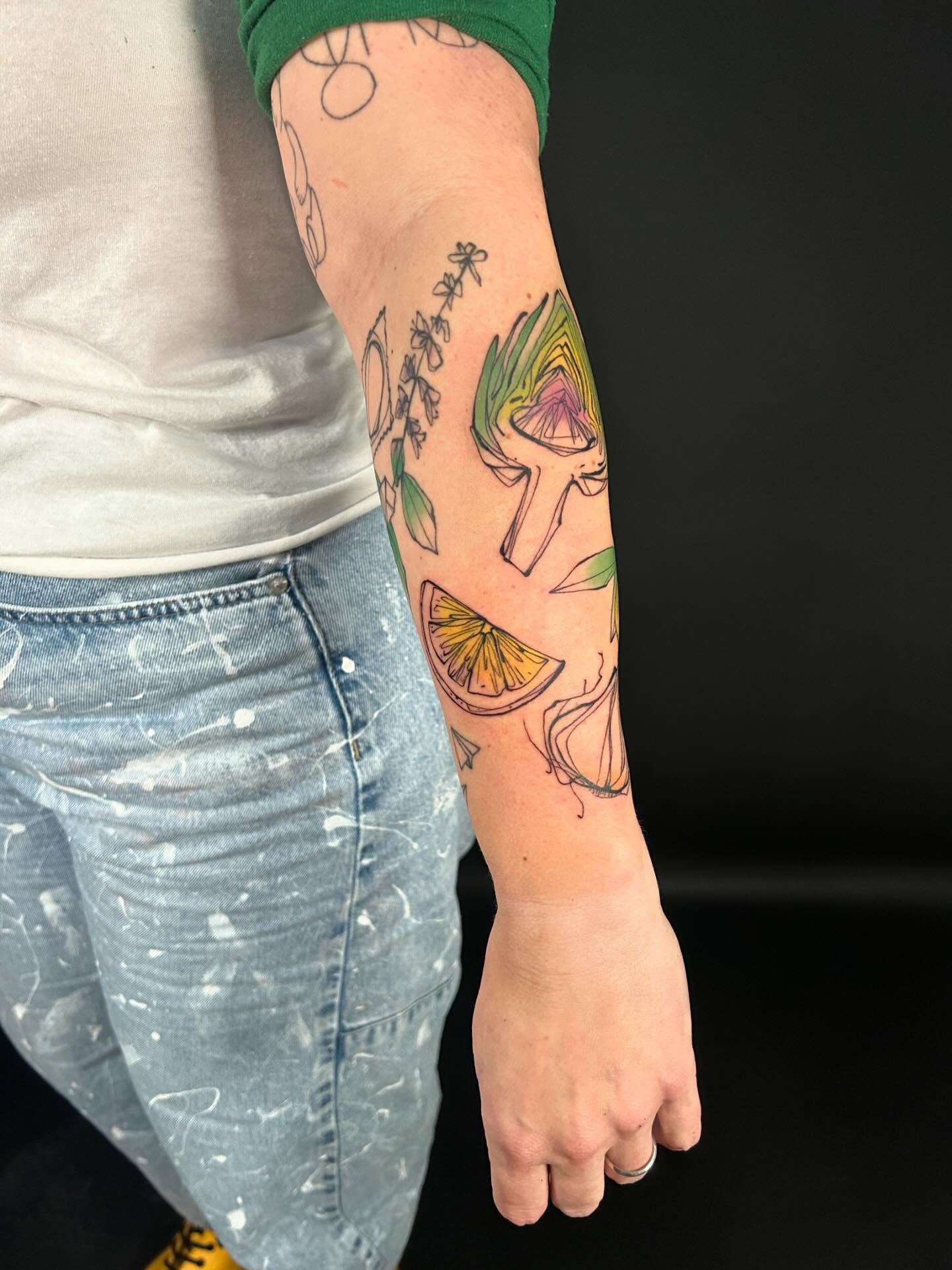 Fruit and abstract shapes new school tattoo on the forearm by @laurabochet_tattoo, Beacon, NY