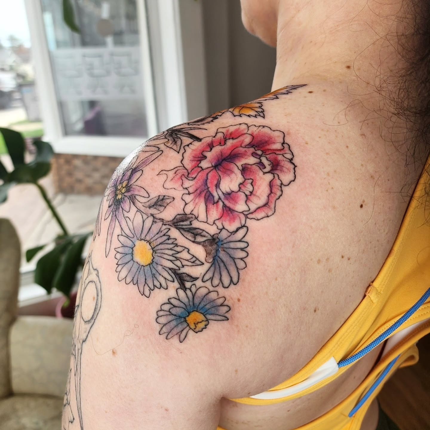 Floral arrangement dotwork tattoo on the shoulder by julian