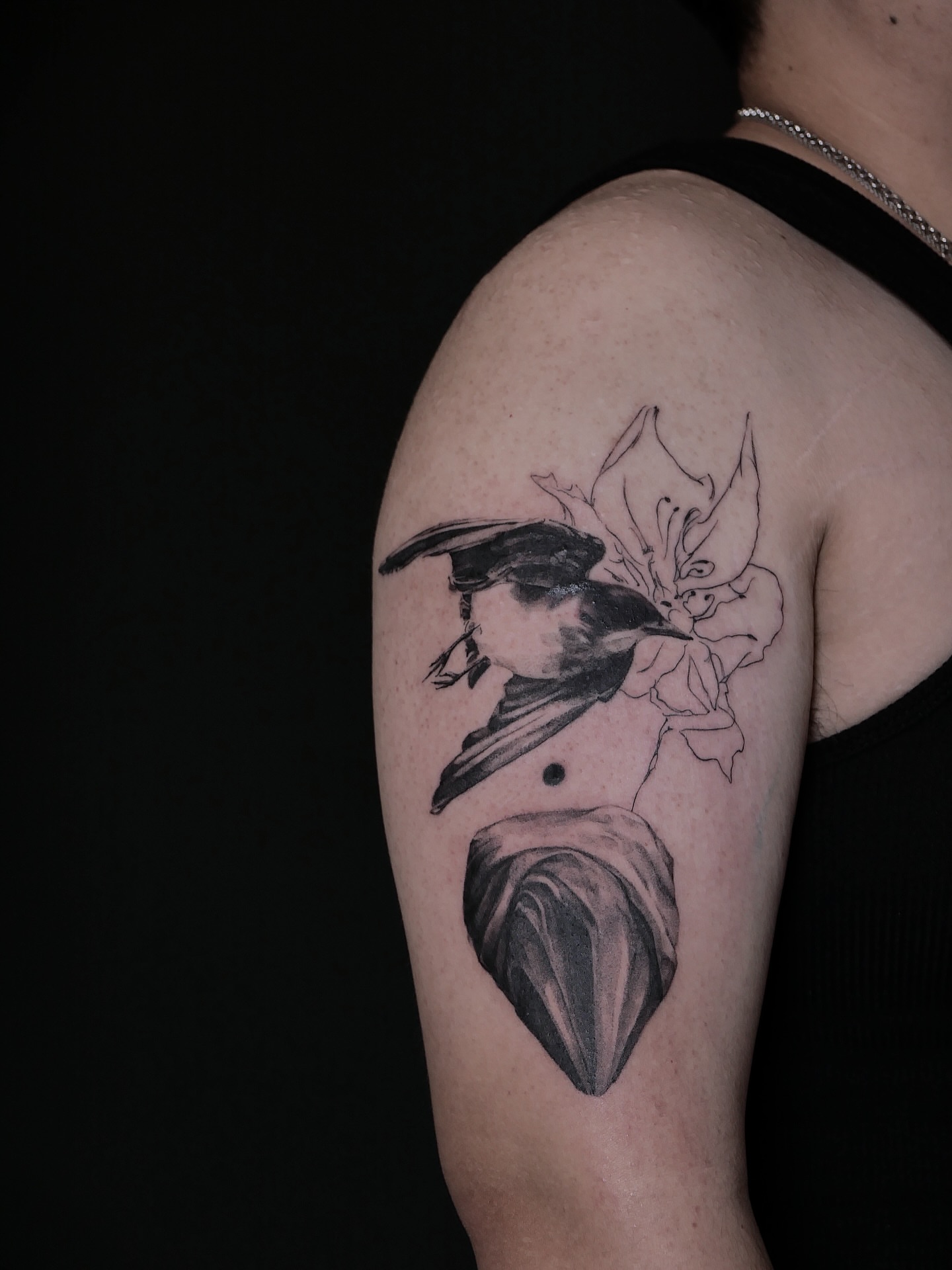 Fairy and bird realism tattoo on the shoulder by Mané, Portland, Oregon