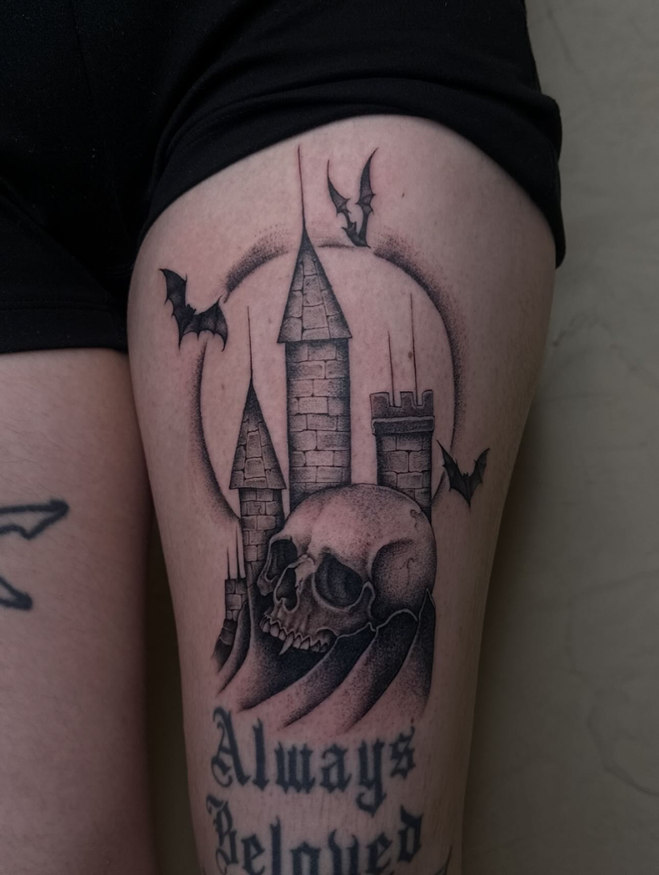 Castle and skull realism tattoo on the thigh by 𝖍𝖆𝖓𝖓𝖆𝖍