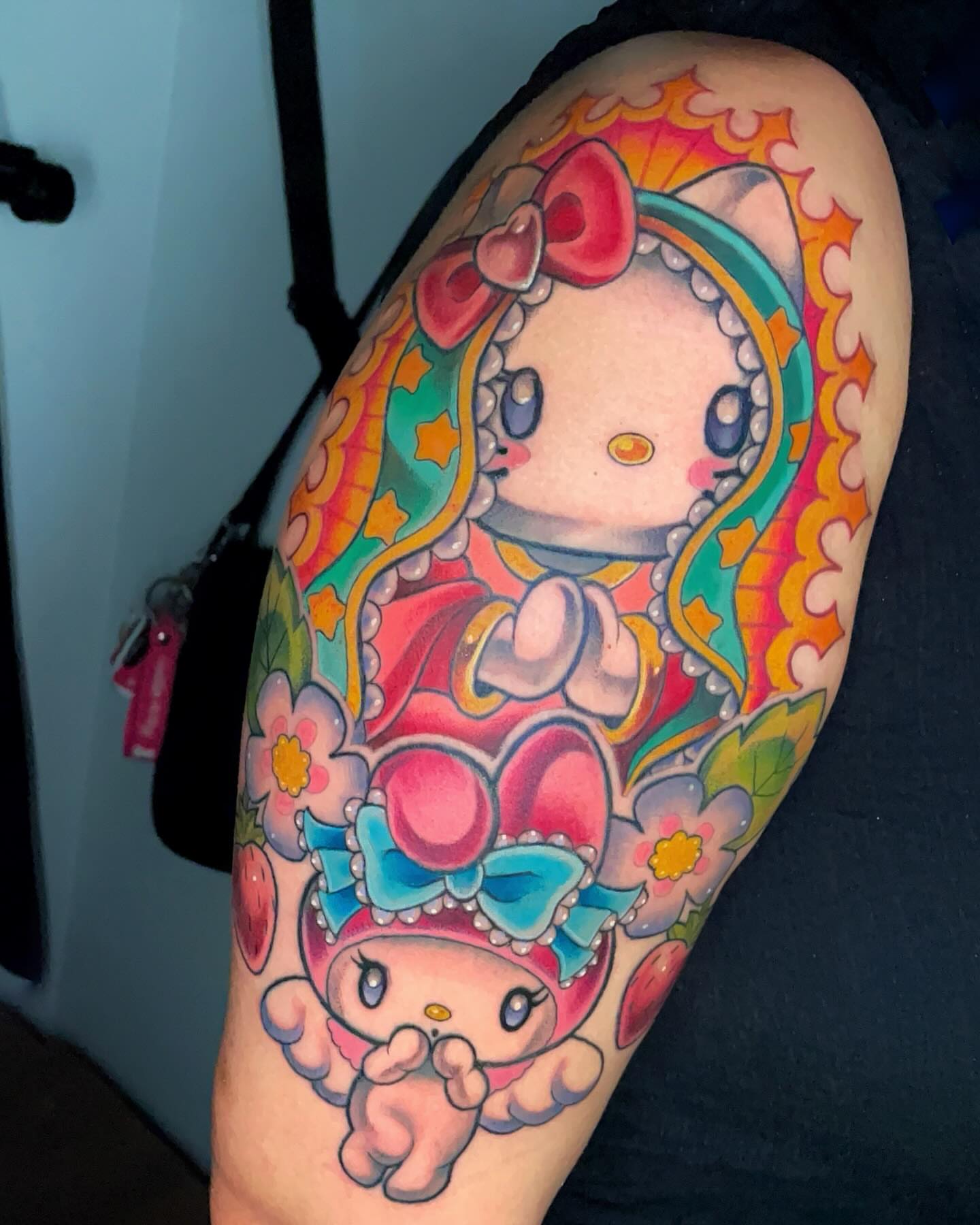 My melody new school tattoo on the upper arm by Xena