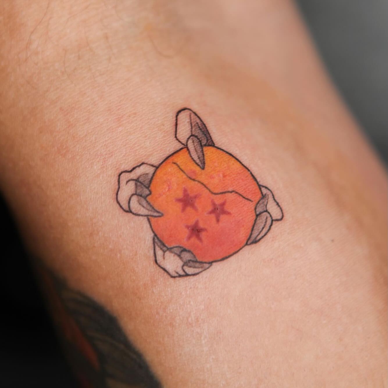 Dragon Ball Z ball dotwork tattoo on the forearm by Liv