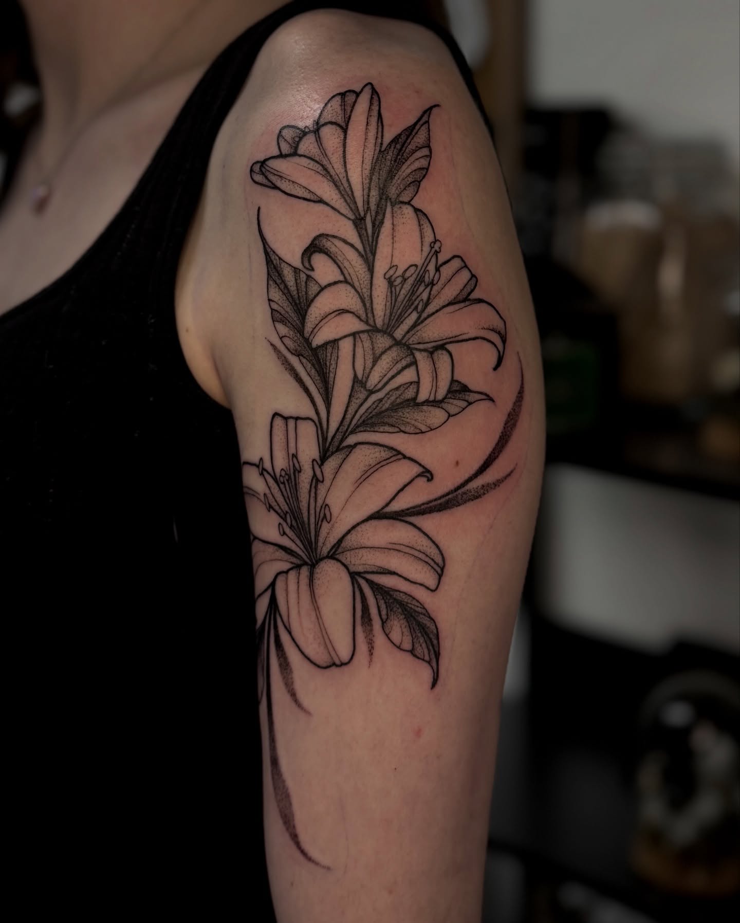 Lilies black and grey tattoo on the forearm by 𝔈𝔩𝔦𝔷𝔞𝔟𝔢𝔱𝔥