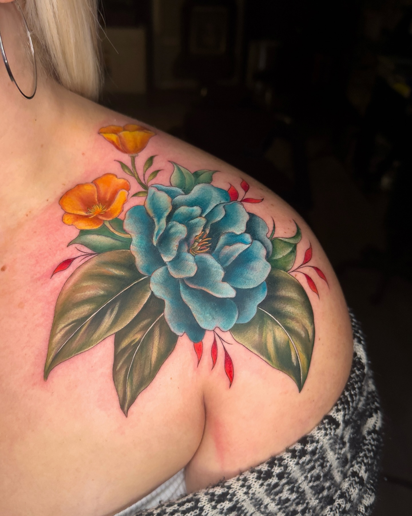 Floral bouquet American traditional tattoo on the shoulder by Nichole Lorence