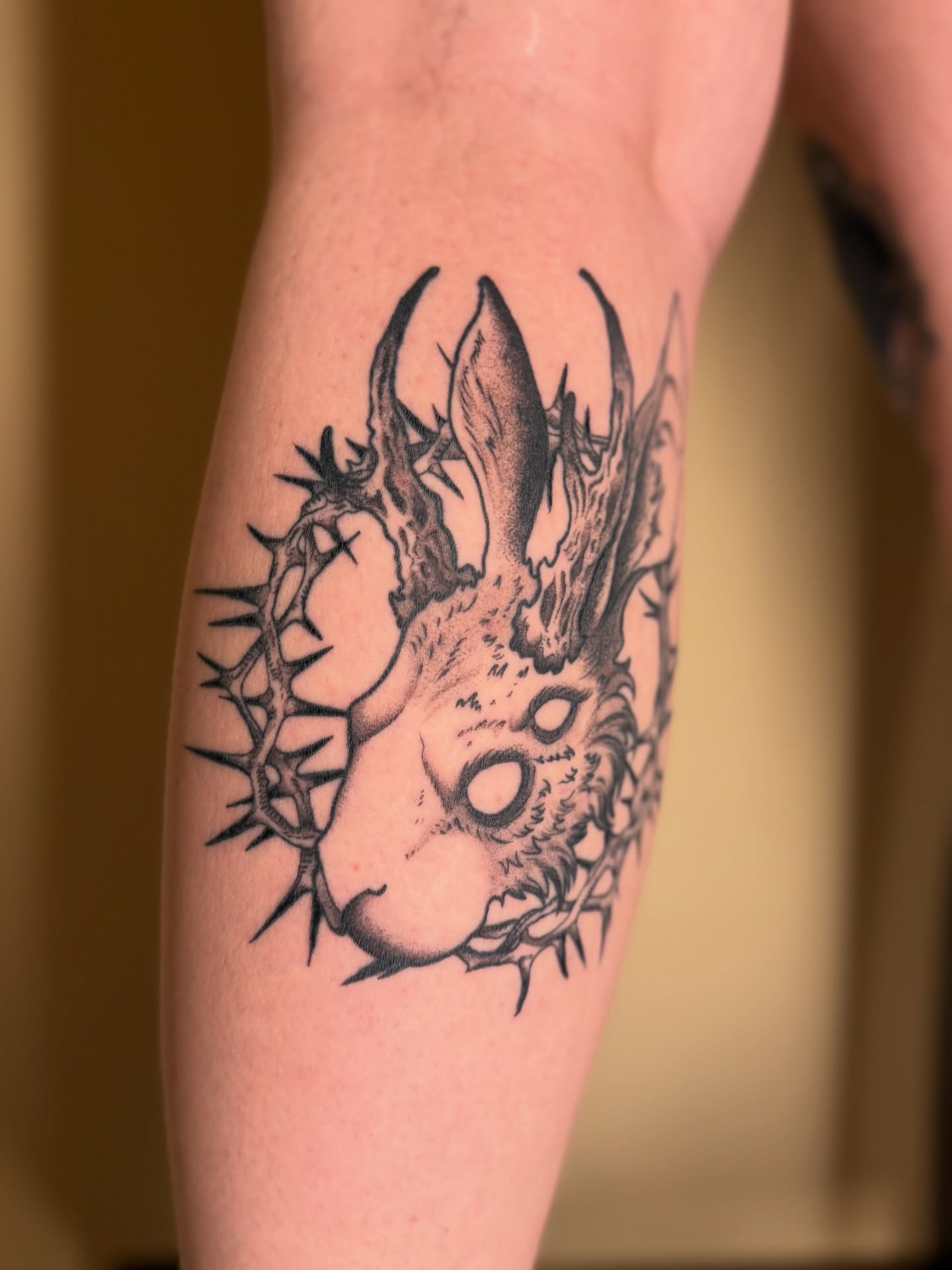 Goat with thorns realism tattoo on the forearm by Austin Poliszuk, Minneapolis, Minnesota